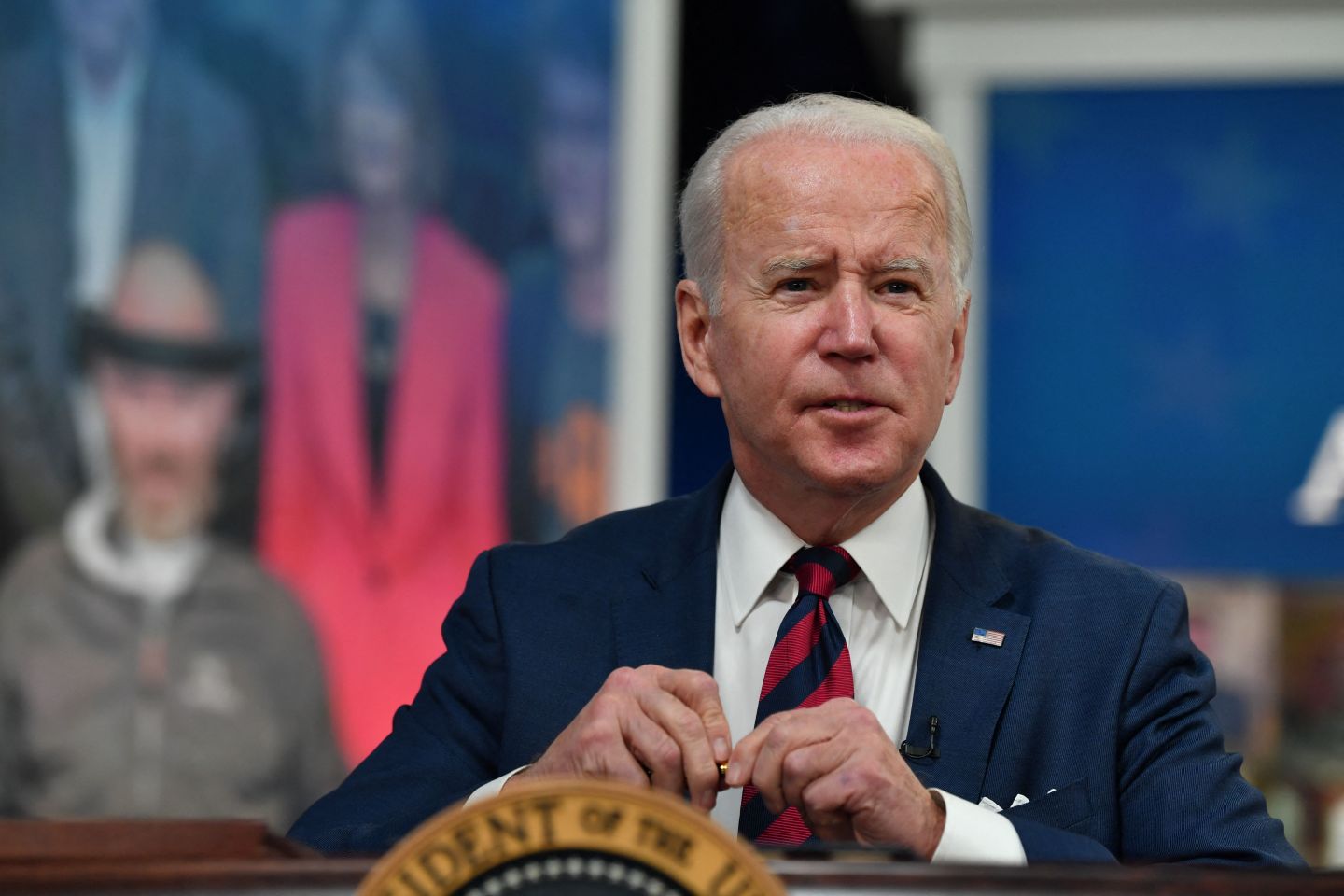 US President Joe Biden signs the Accelerating Access to Critical Therapies for ALS Act" in the South Court Auditorium of the White House in Washington, DC on December 23, 2021.