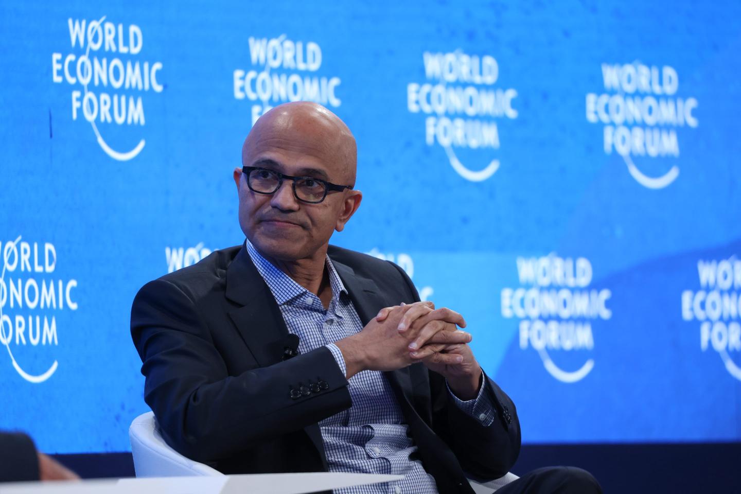 MIcrosoft CEO Satya Nadella attending a panel event at the World Economic Forum