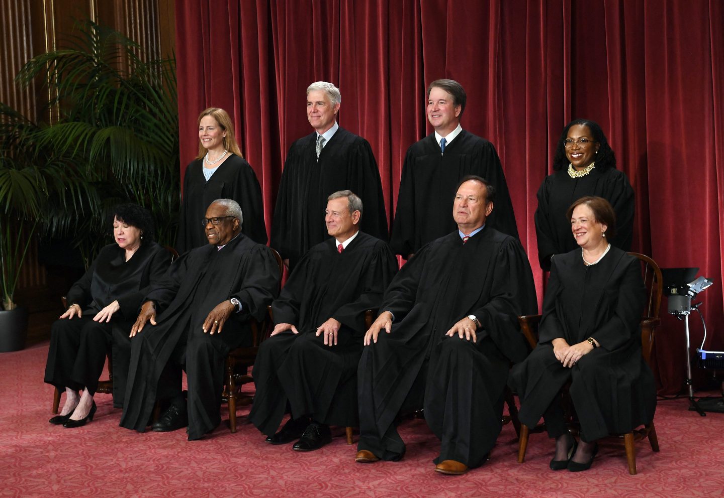 The nine Supreme Court Justices lined up for a group photo