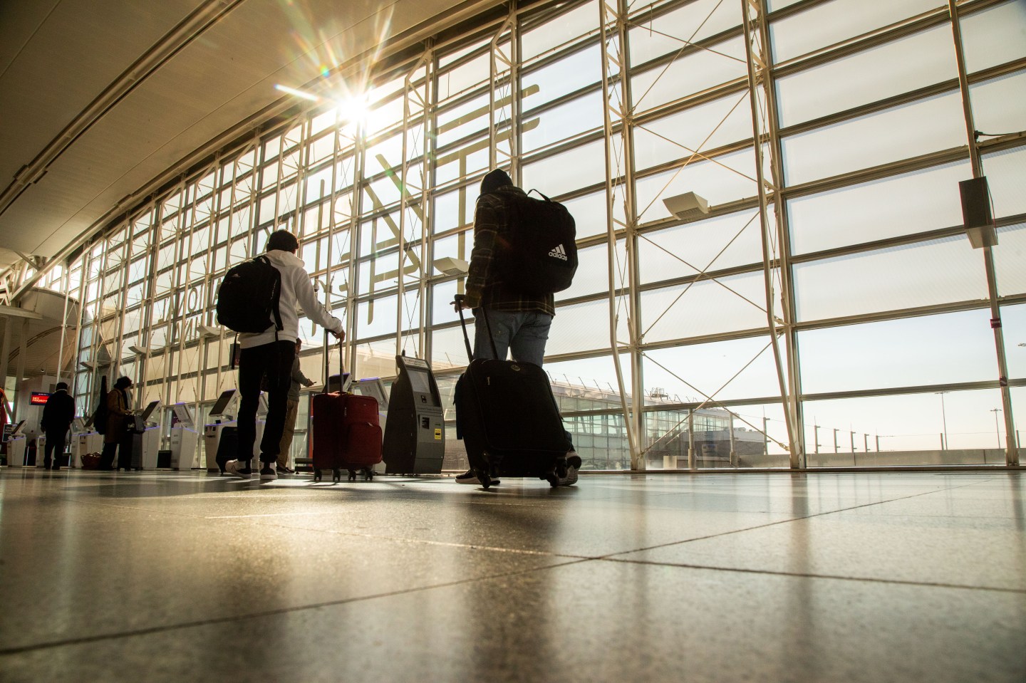 Travelers at Terminal 4 at John F. Kennedy International Airport (JFK) ahead of the Thanksgiving holiday in New York, US, on Wednesday, Nov. 23, 2022.