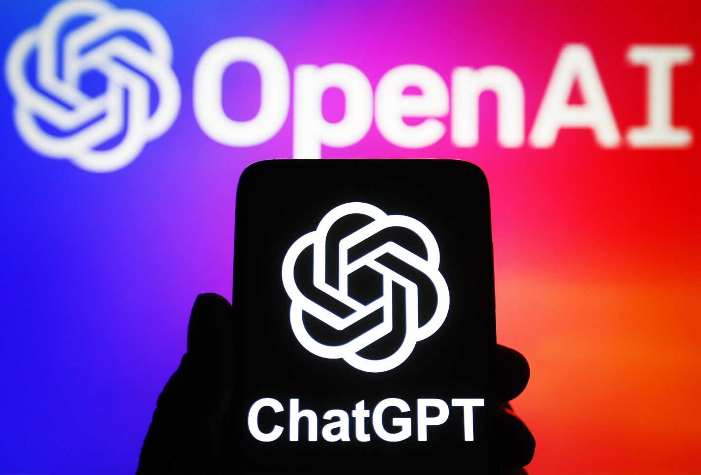 Photo showing logo of ChatGPT and OpenAI