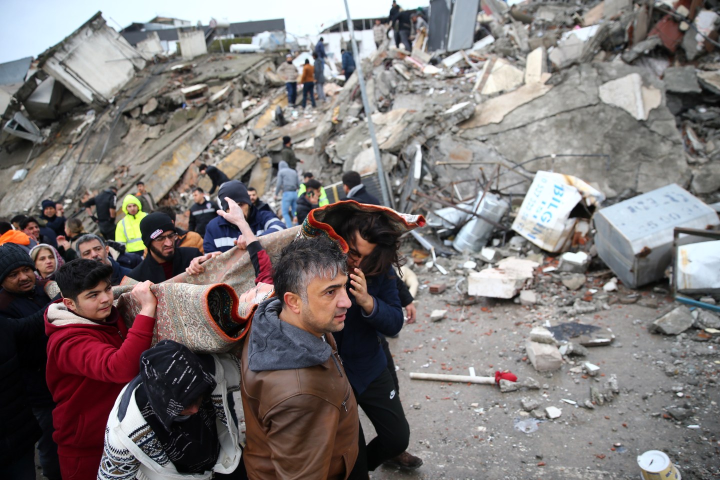 A person is being rescued under rubble after 7.7 magnitude earthquake hits Turkiyeâs southern provinces, in Iskenderun district of Hatay, Turkiye on Feb. 6, 2023.