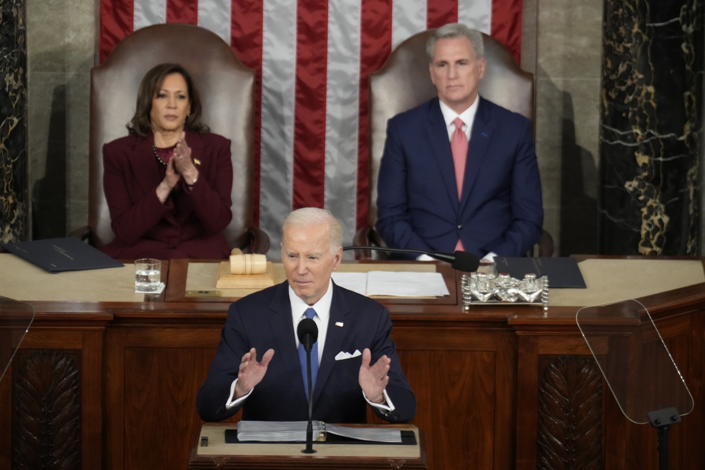 President Joe Biden speaks as Vice President Kamala Harris, left, and Speaker of the House Kevin McCarthy (R-CA), right, listen during a State of the Union address at the U.S. Capitol on Tuesday, Feb. 7, 2023 in Washington, DC.