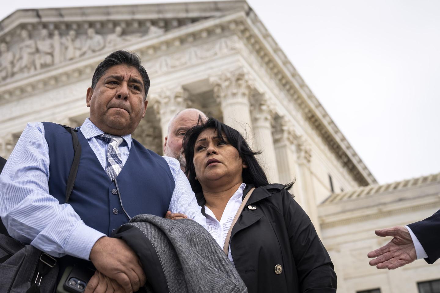 Jose Hernandez and Beatriz Gonzalez, stepfather and mother of Nohemi Gonzalez, who died in a terrorist attack in Paris in 2015, arrive to speak to the press outside of the U.S. Supreme Court.