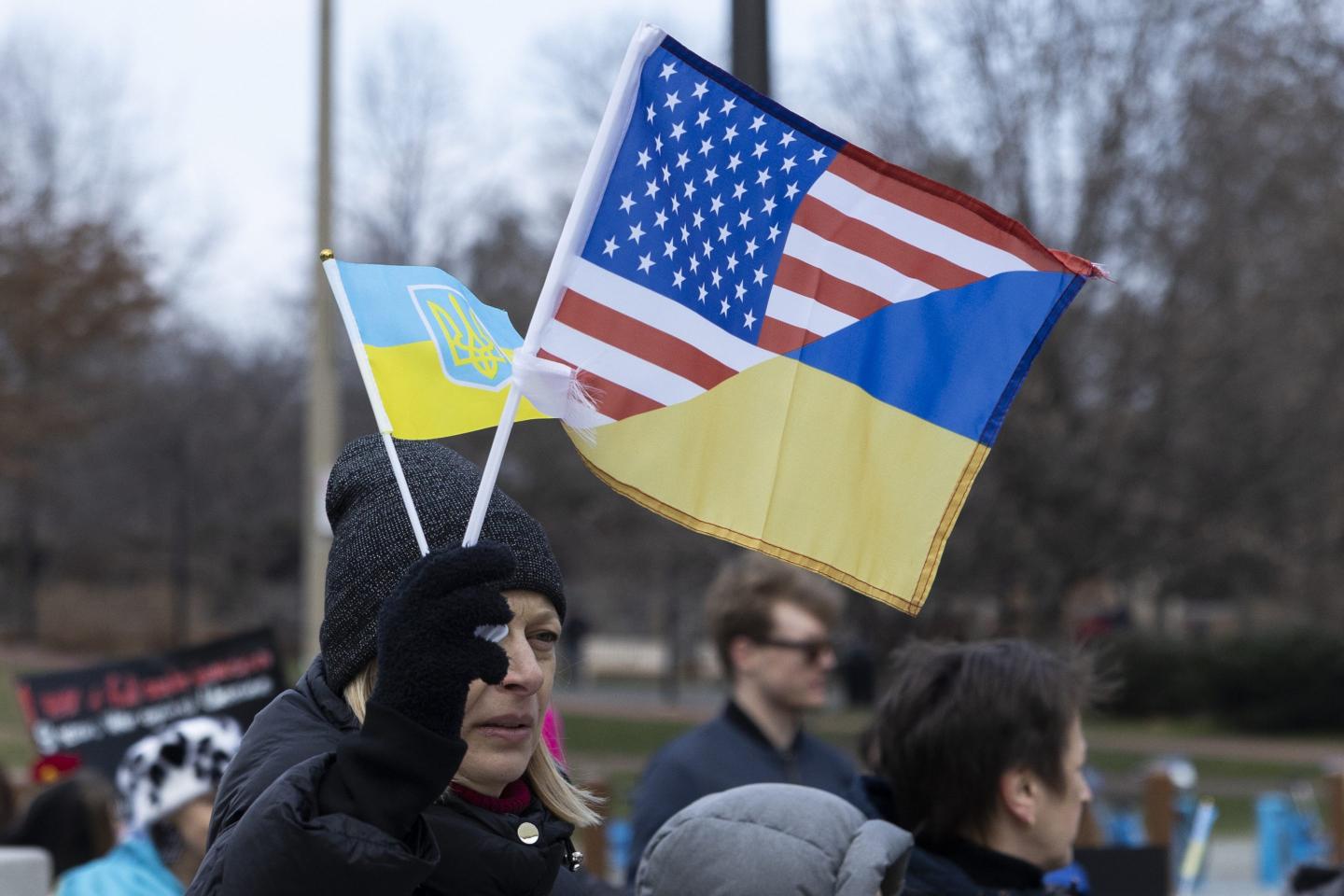 Demonstrators during a rally against Russia's invasion of Ukraine in Philadelphia, Pennsylvania, US, on Sunday, Feb. 26, 2023.