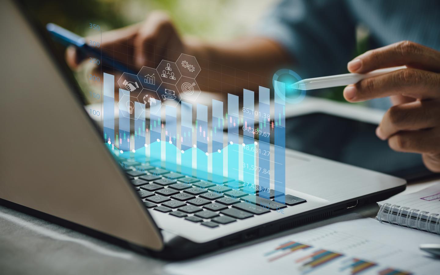 businessman investment consultant analyzing company financial report balance sheet statement working with digital graphs.