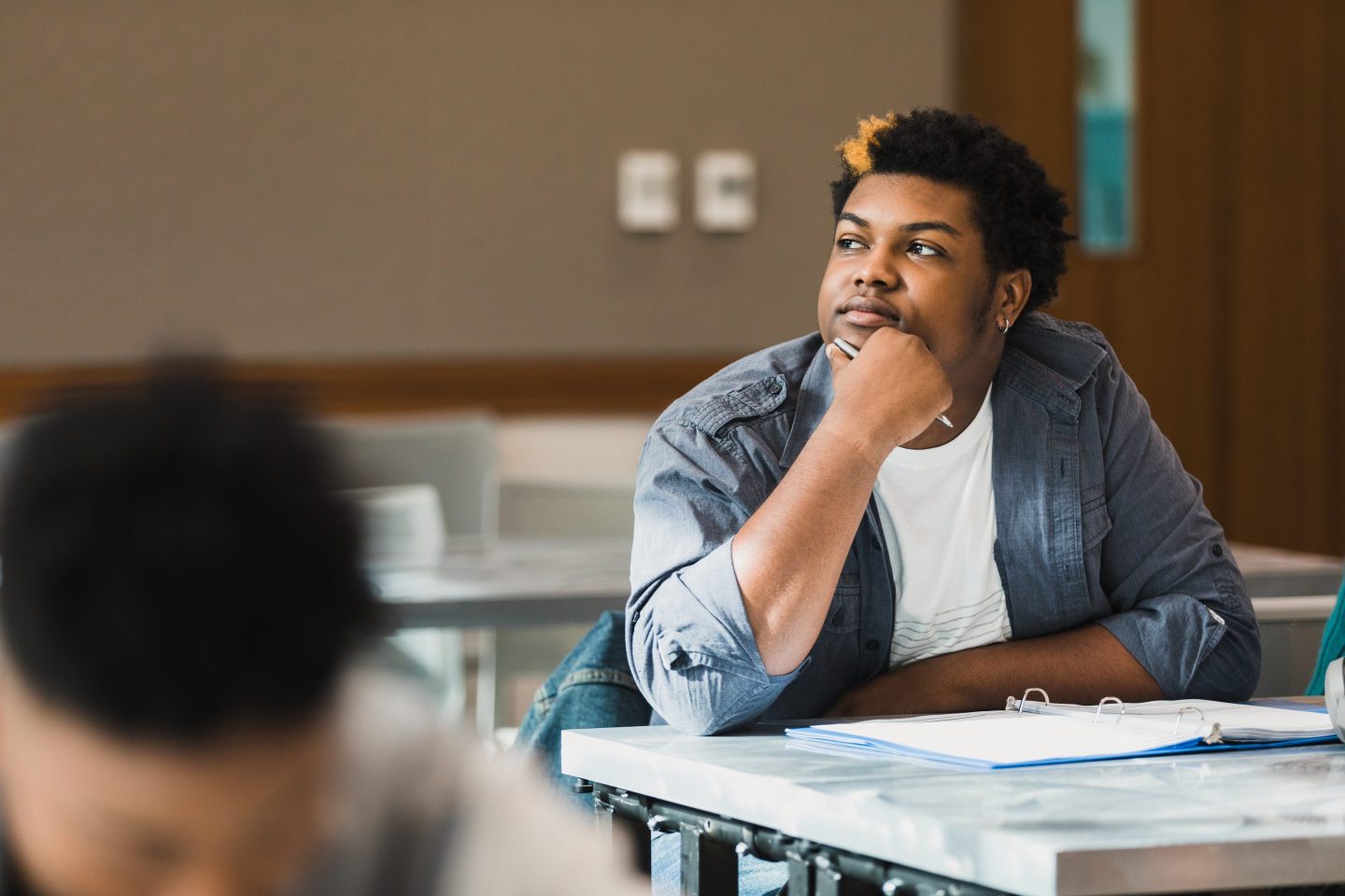 male student at desk