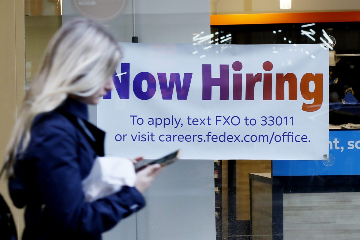 A ”Now Hiring” sign in New York City.