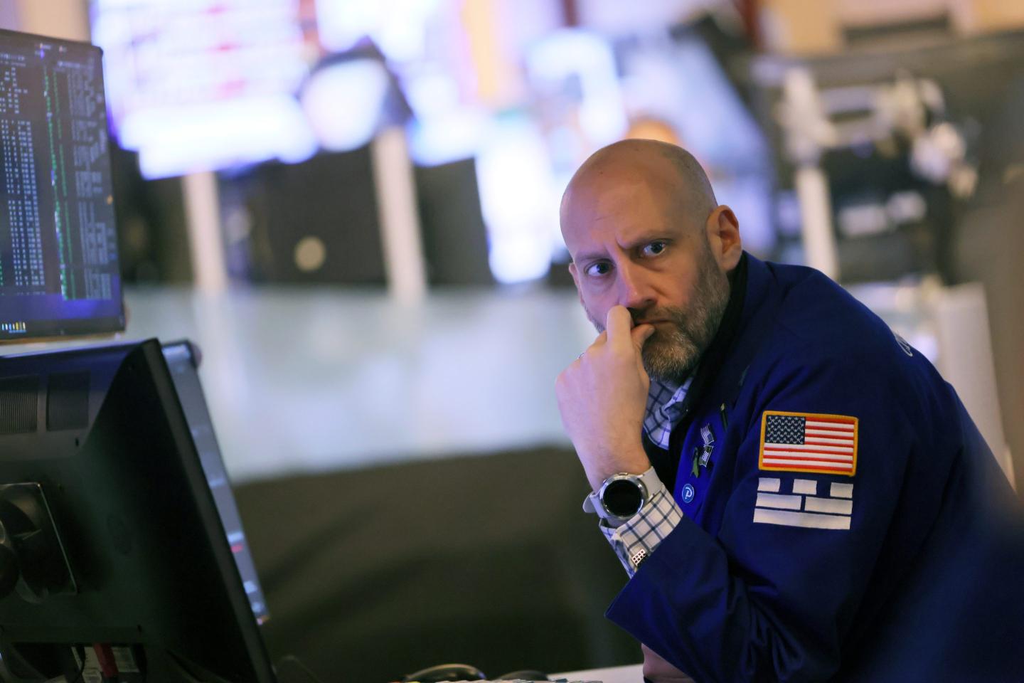 Traders work on the floor of the New York Stock Exchange (NYSE) during morning trading on February 01, 2023 in New York City.
