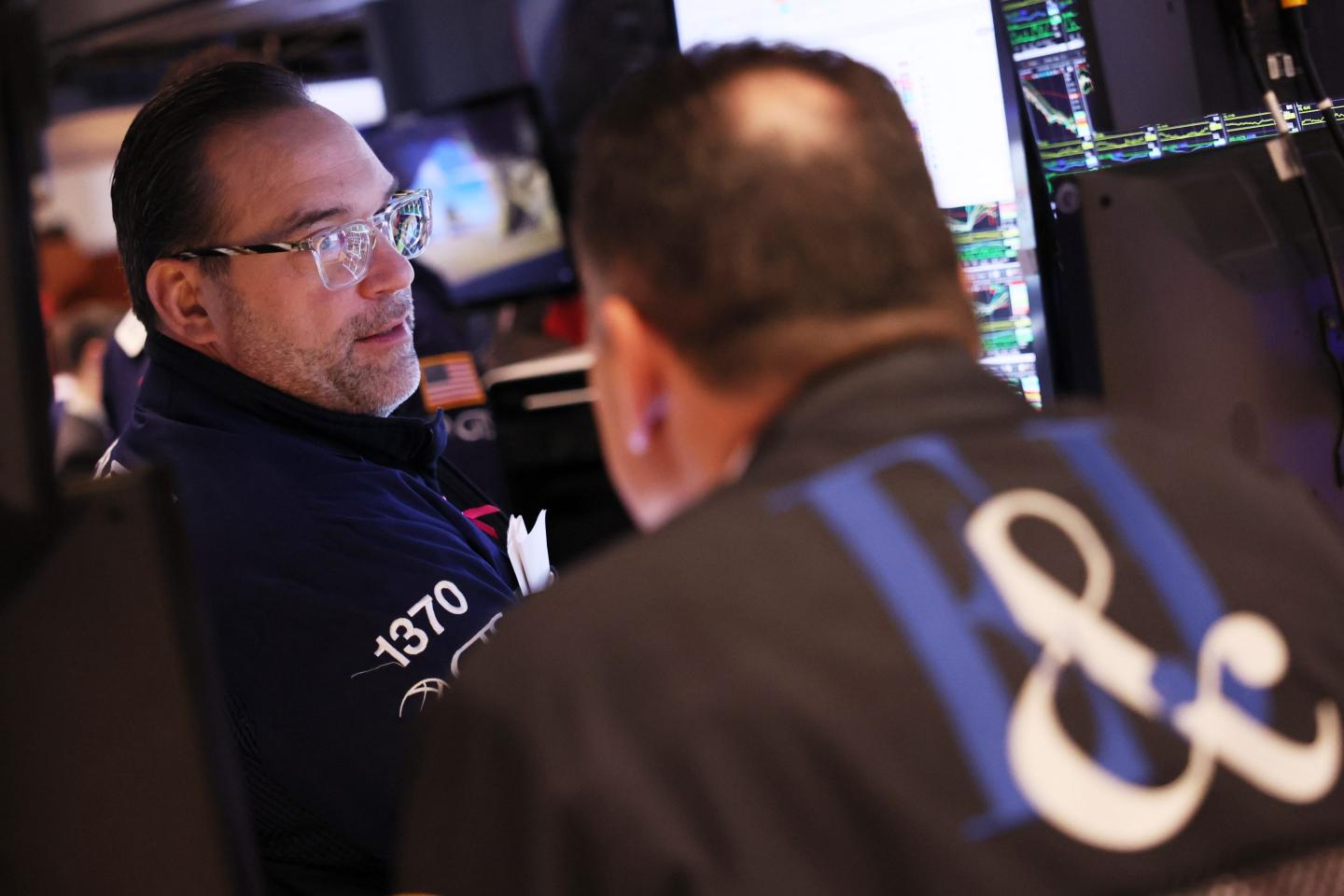 Traders work the floor of the New York Stock Exchange on Friday.