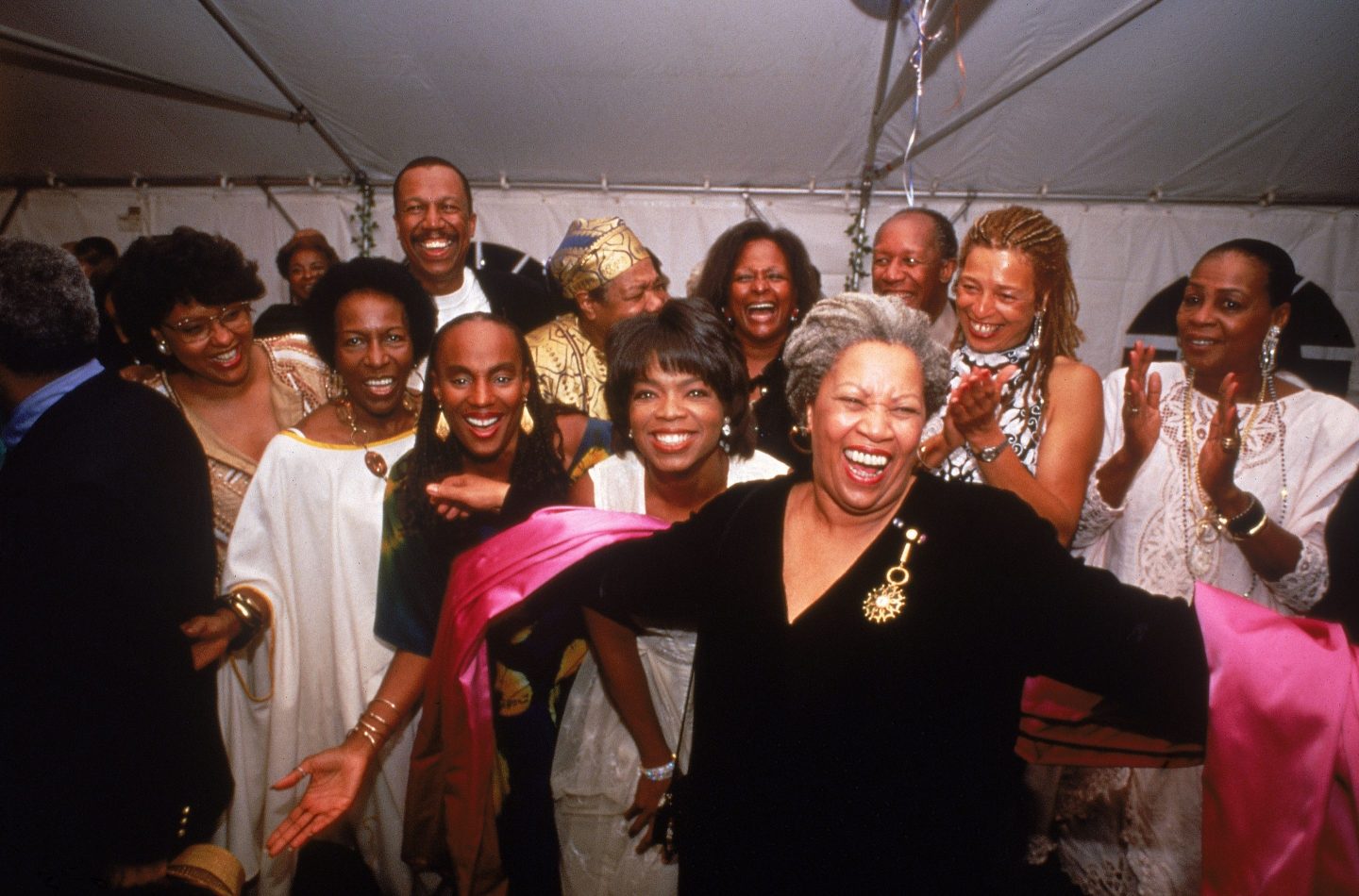 Nobel laureate Toni Morrison (C) accepting the applause of partygoers Susan Taylor, Rita Dove, Oprah Winfrey, Angela Davis, Maya Angelou & others; Winston-Salem.