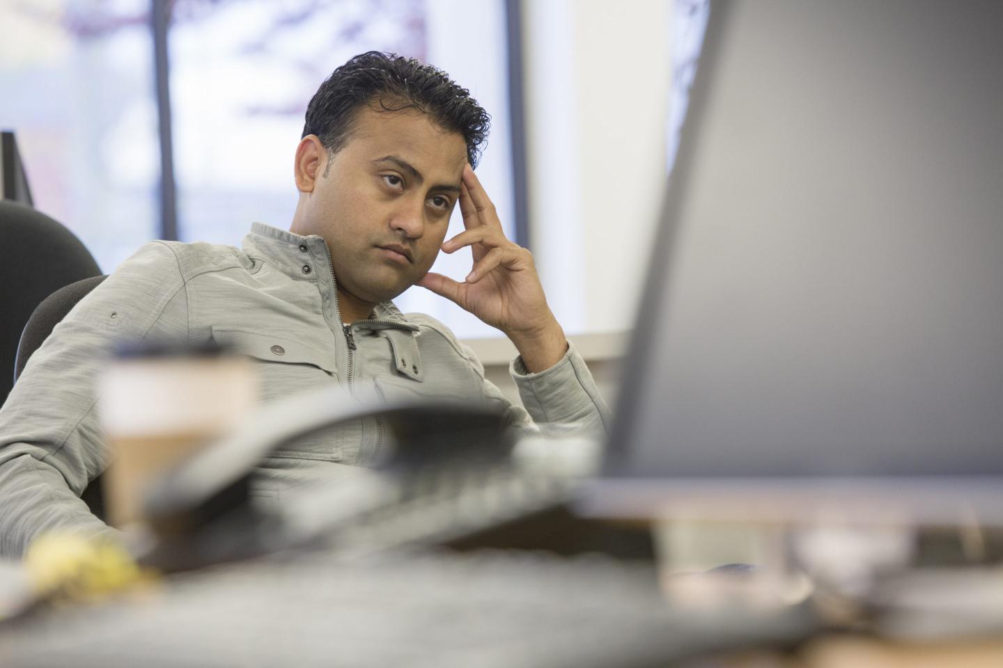 Angry worker at his computer