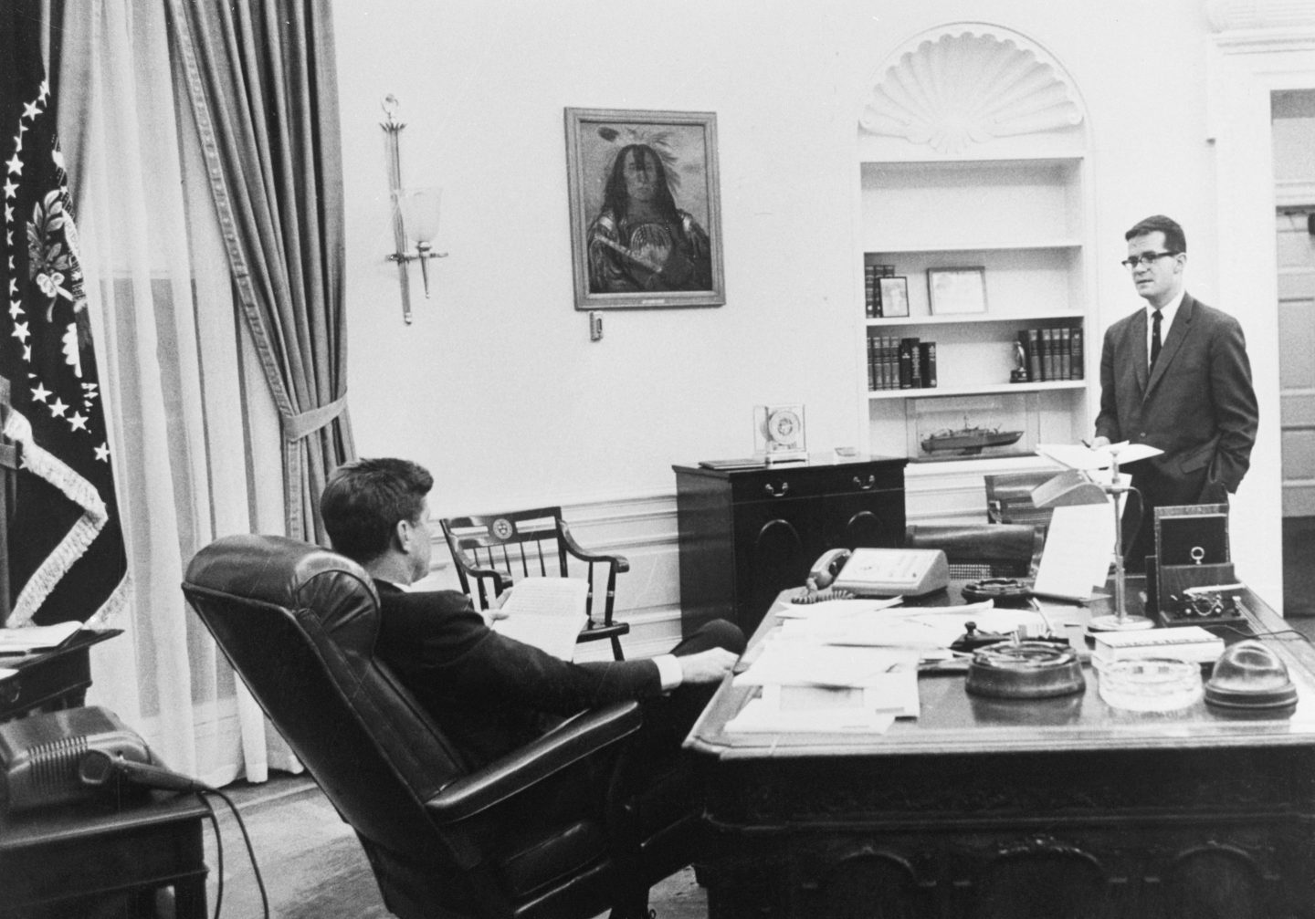 President John F. Kennedy talks with close associate Theodore C. Sorenson in March 1961.