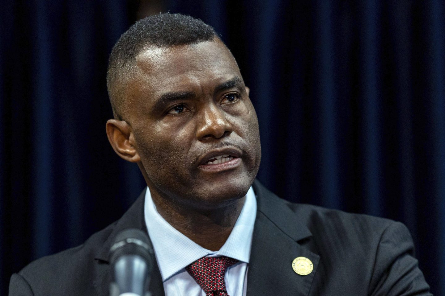 US Attorney Markenzy Lapointe speaks about a network of nursing school operators, centered in South Florida, who allowed students to buy diplomas without the proper training, during a press conference in Miami, Jan. 25, 2023.