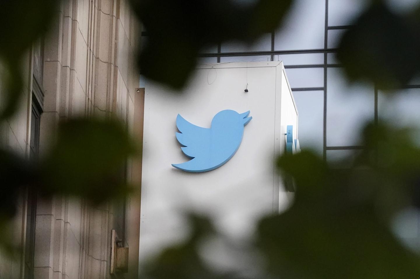 sign at Twitter headquarters is shown in San Francisco, Dec. 8, 2022.