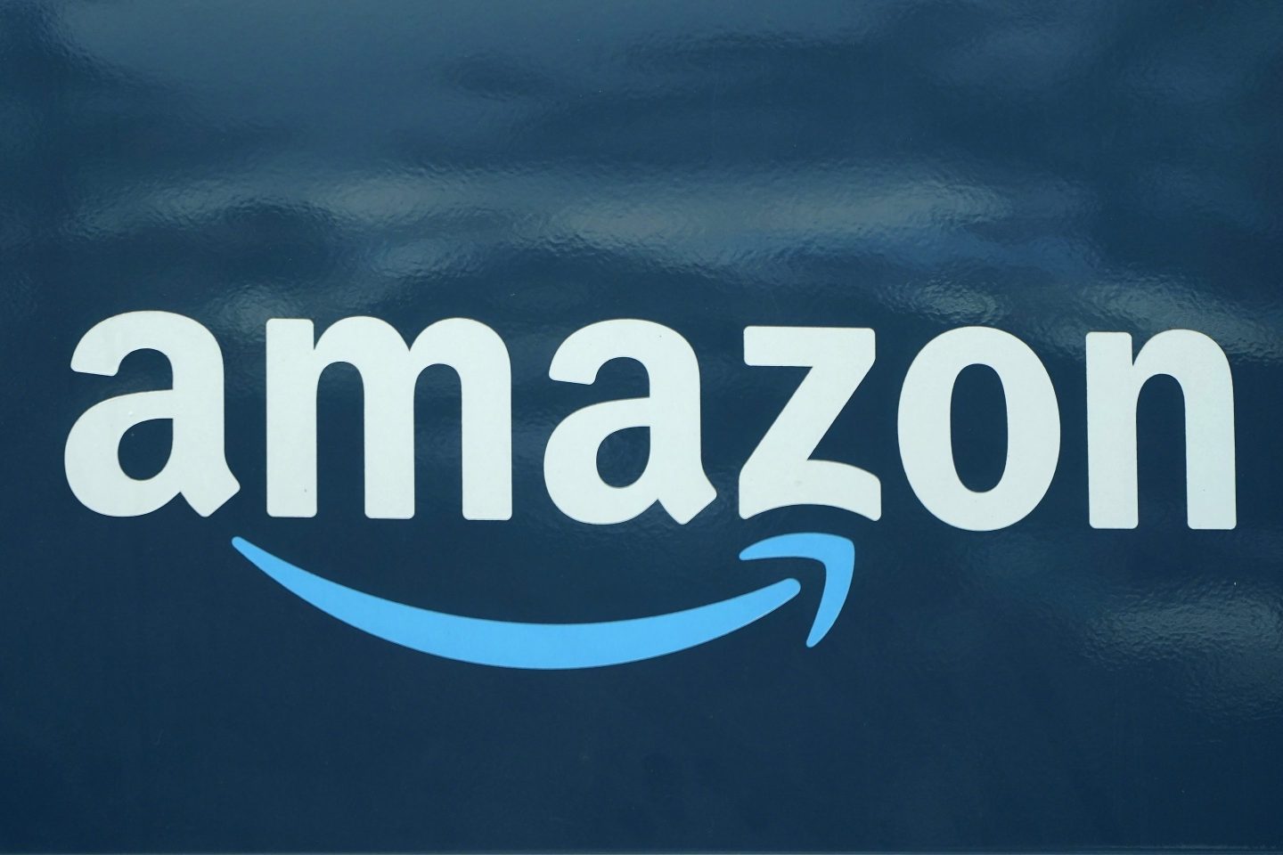 An Amazon logo appears on a delivery van, Oct. 1, 2020, in Boston.