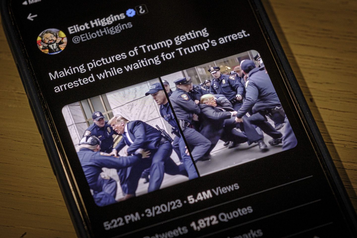 Images created by Eliot Higgins with the use of artificial intelligence show a fictitious skirmish with Donald Trump and New York City police officers posted on Higgins' Twitter account, as photographed on an iPhone in Arlington, Va., Thursday, Mar. 23, 2023.