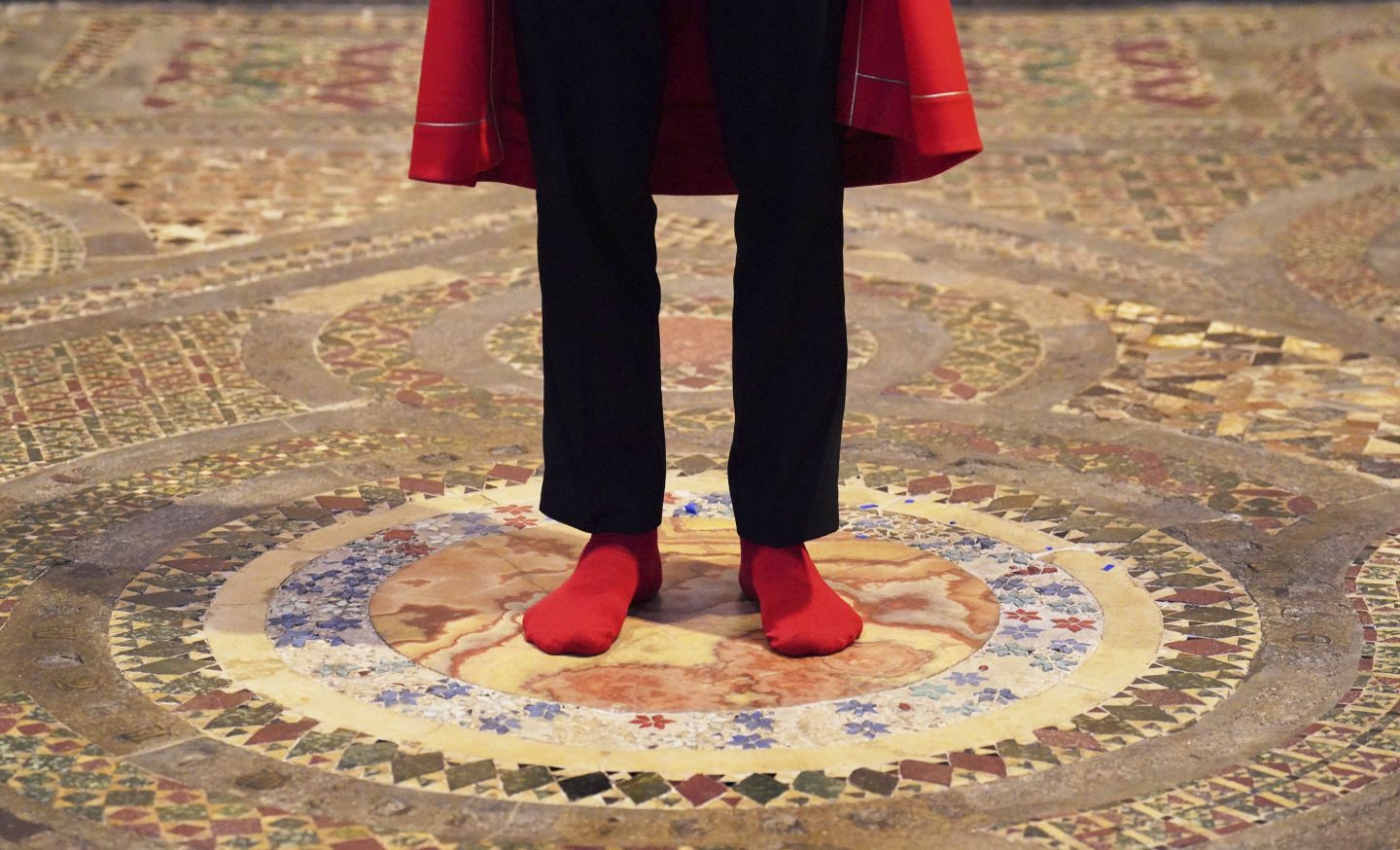 Abbey Marshal Howard Berry stands at the centre of the Cosmati pavement, located before the altar, during a photo call at Westminster Abbey, central London, to announce special events to celebrate the Coronation of King Charles III, Thursday March 23, 2023. 