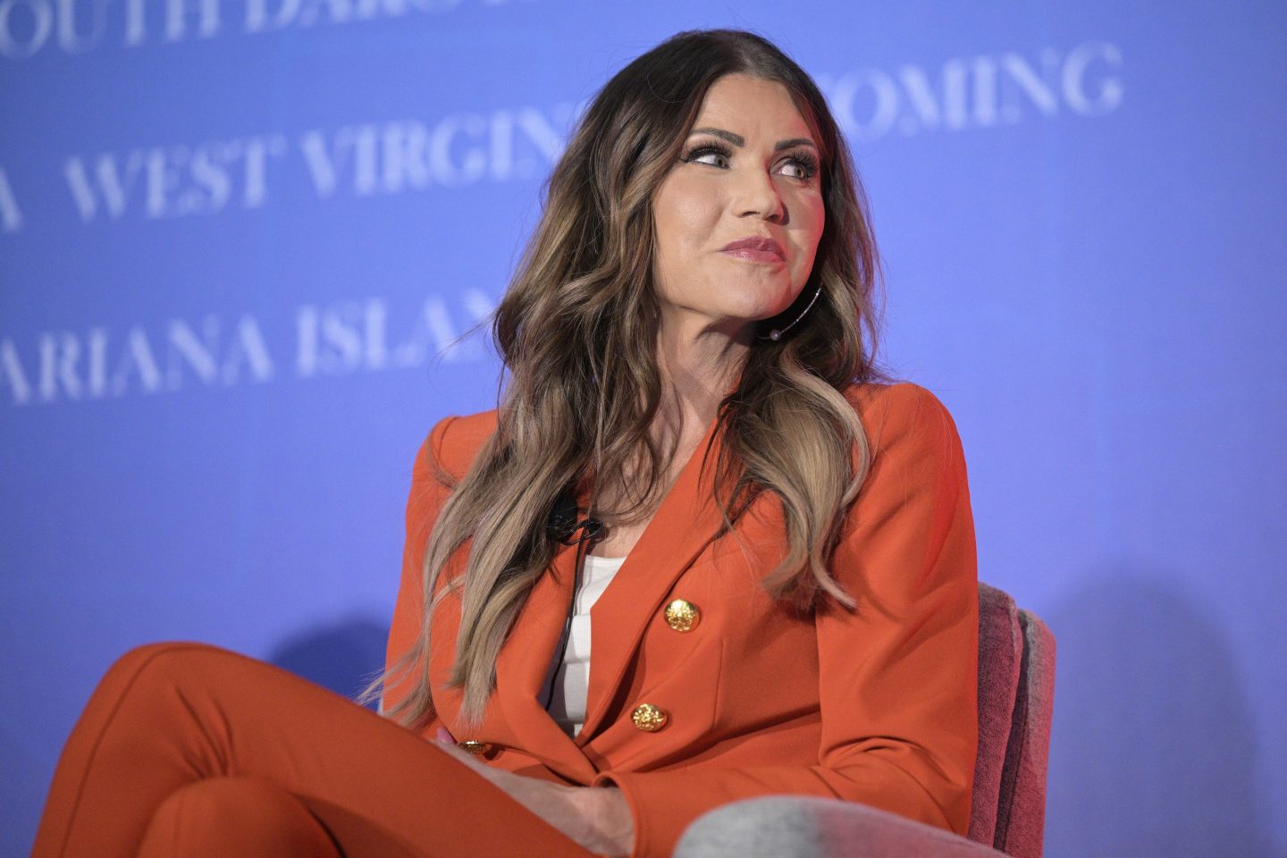 South Dakota Gov. Kristi Noem takes part in a panel discussion during a Republican Governors Association conference, Nov. 15, 2022, in Orlando, Fla.