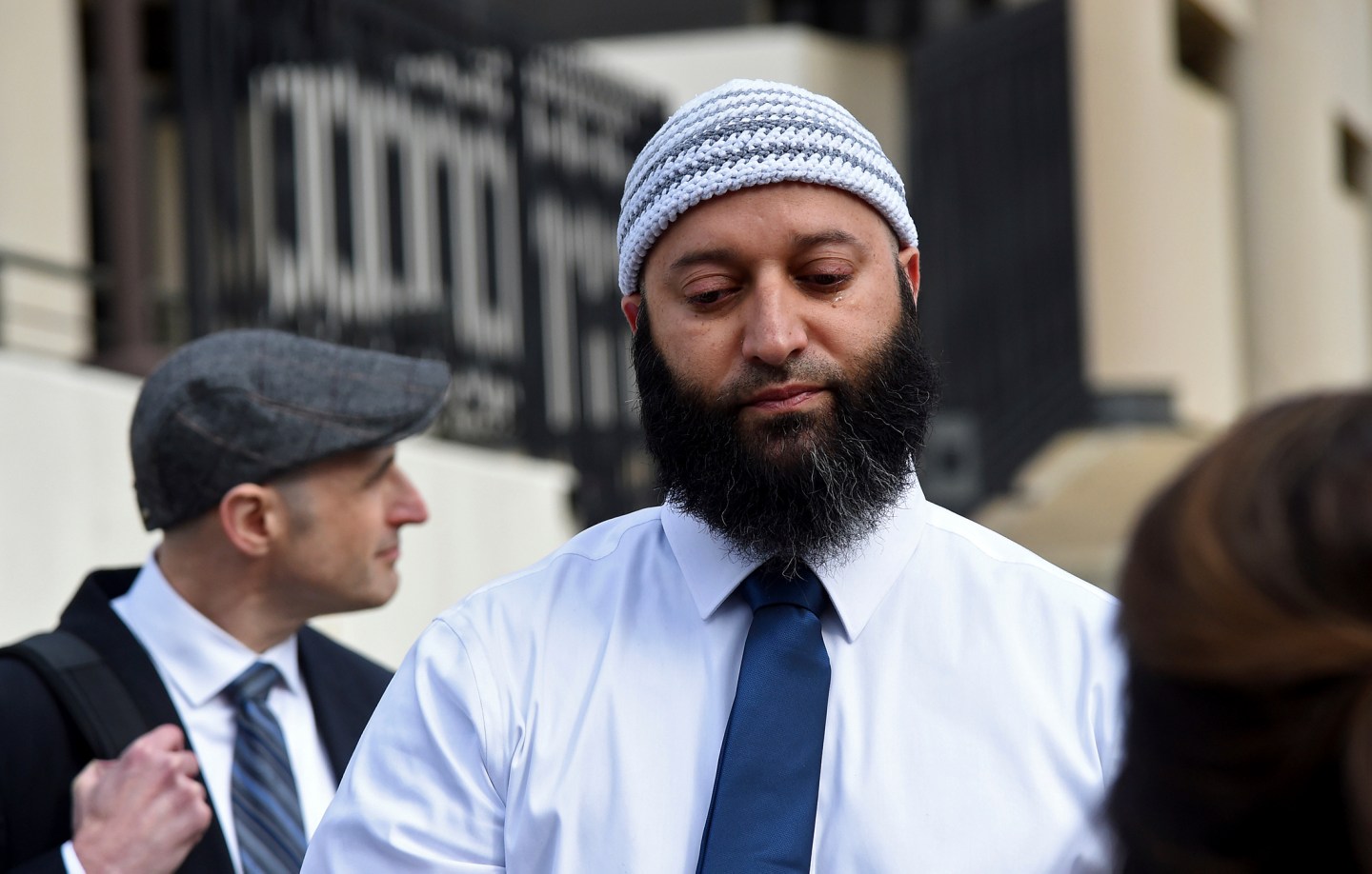 Adnan Syed gets emotional as he speaks to reporters outside the Robert C. Murphy Courts of Appeal building after a hearing, Thursday, Feb. 2, 2023, in Annapolis, Md.