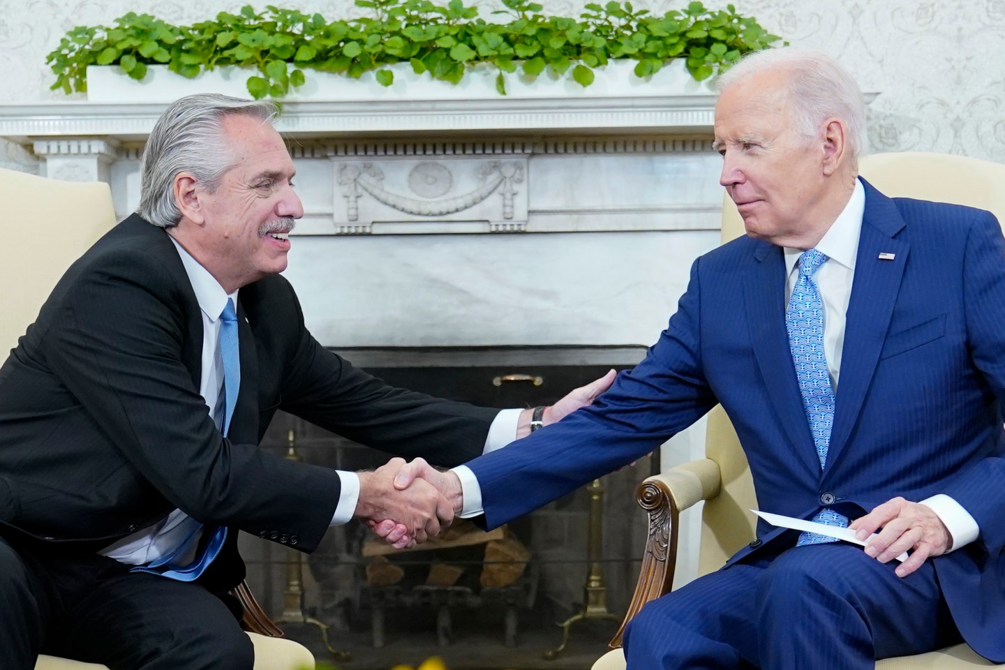 President Joe Biden meets with Argentina's President Alberto Fernandez in the Oval Office of the White House in Washington, Wednesday, March 29, 2023. (AP Photo/Susan Walsh)