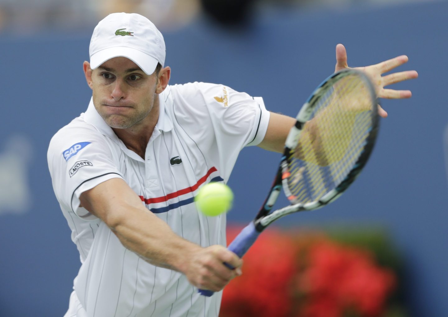 Andy Roddick returns a shot to Italy's Fabio Fognini in the third round of play at the 2012 US Open tennis tournament, Sept. 2, 2012, in New York.