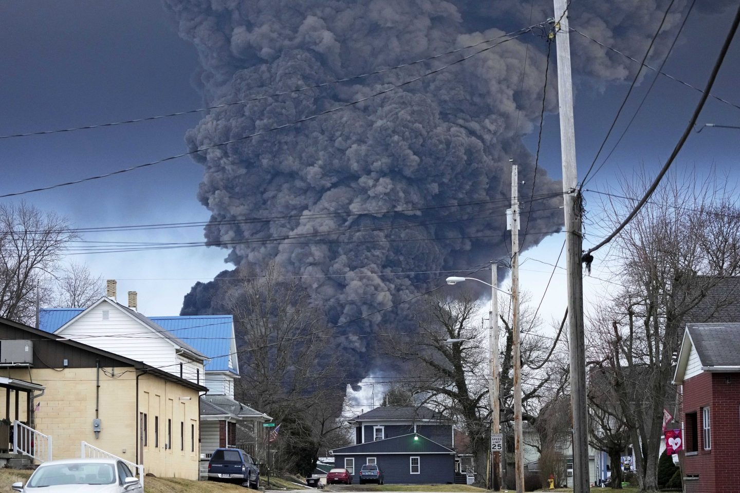 This photo taken with a drone shows portions of a Norfolk and Southern freight train that derailed Friday night in East Palestine, Ohio are still on fire at mid-day Saturday, Feb. 4, 2023.