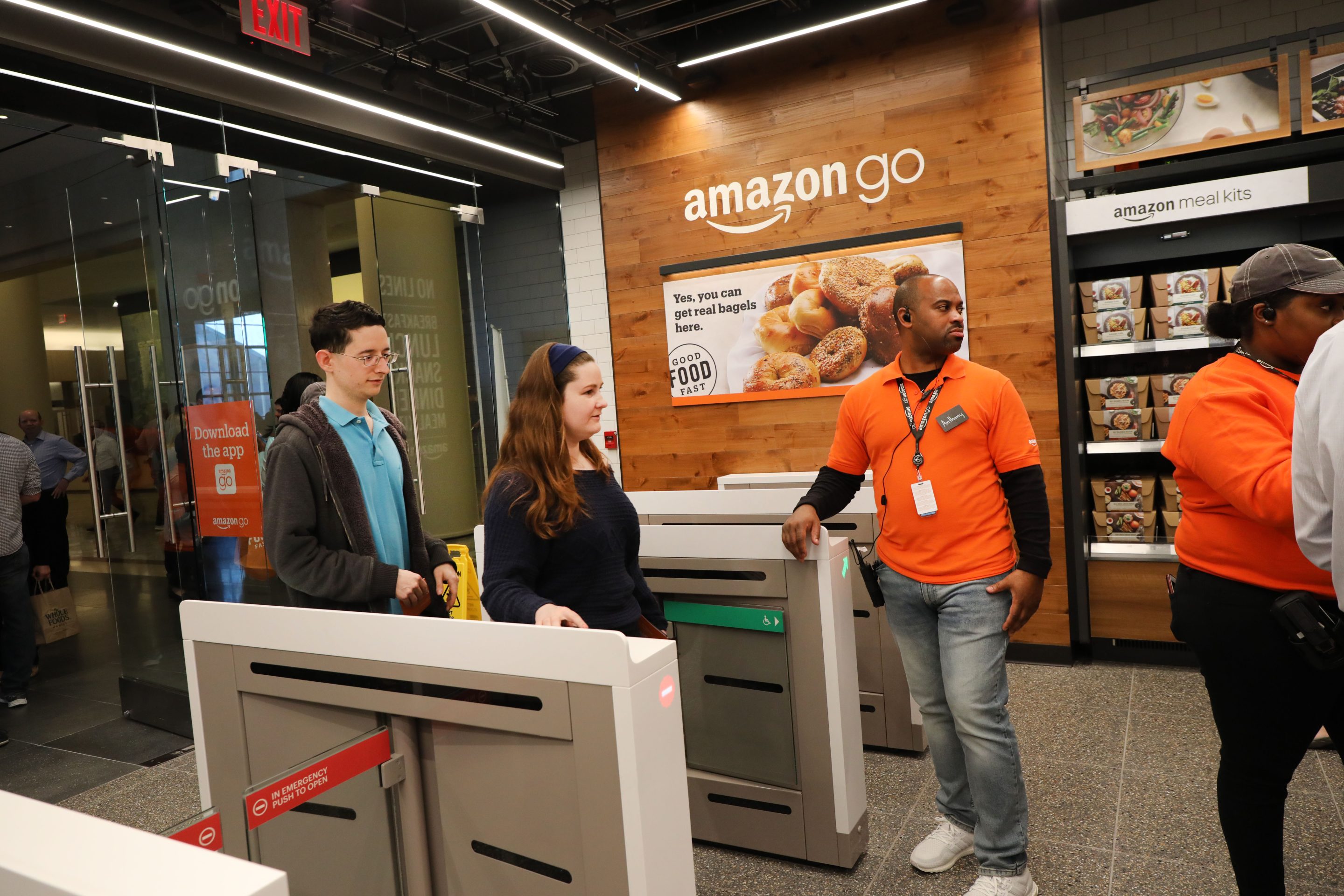 Customers shop at the cashier-less Amazon Go store on May 7, 2019 in New York City.