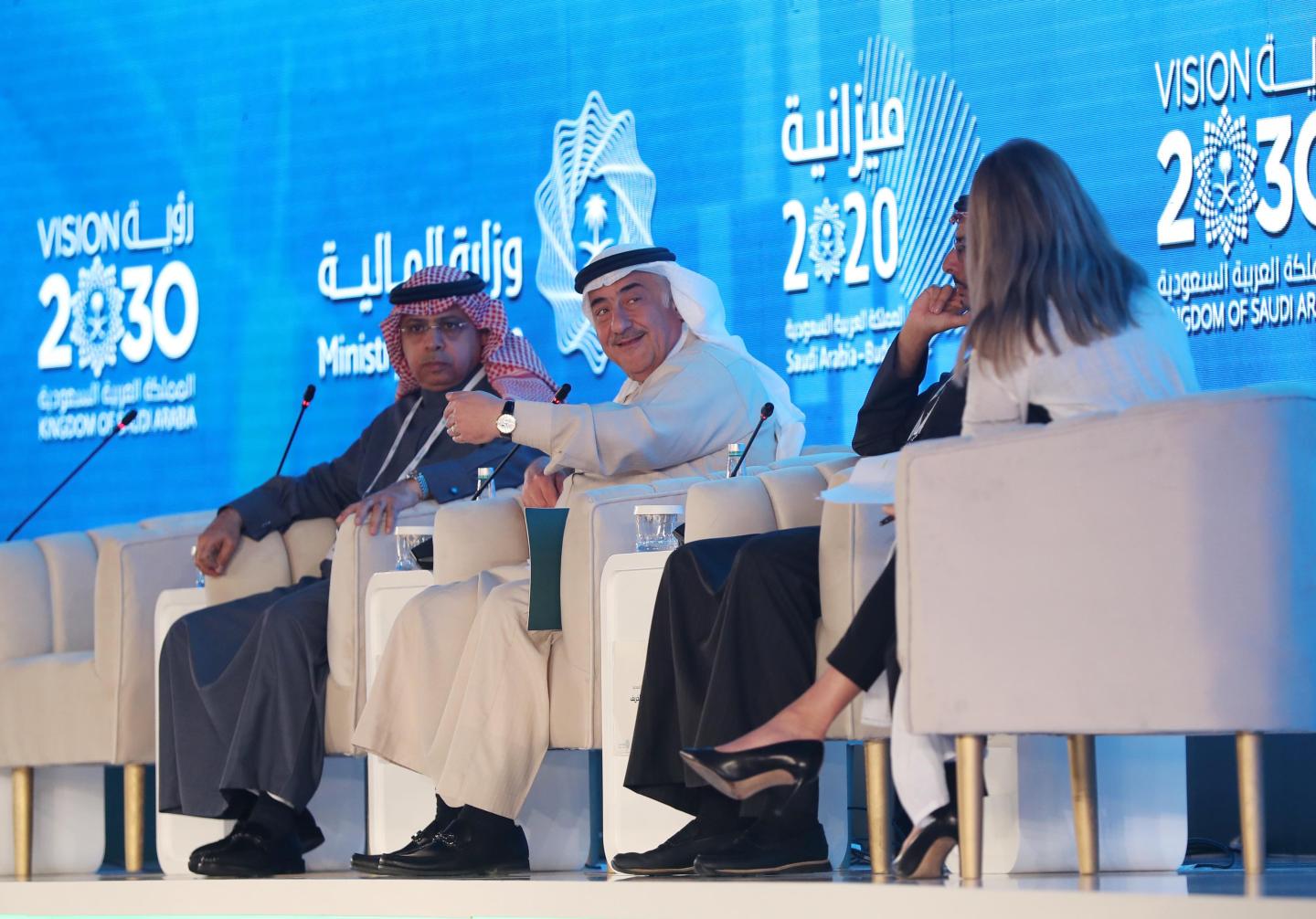 Saudi National Bank chairman Ammar Al Khudairy (center)