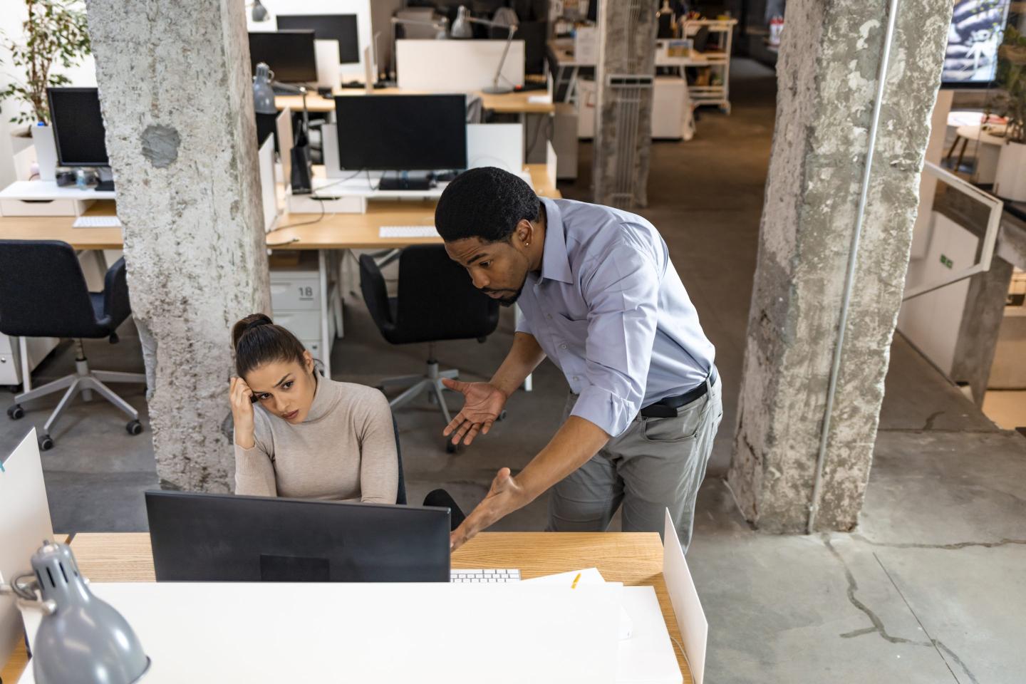Boss shouting at worker