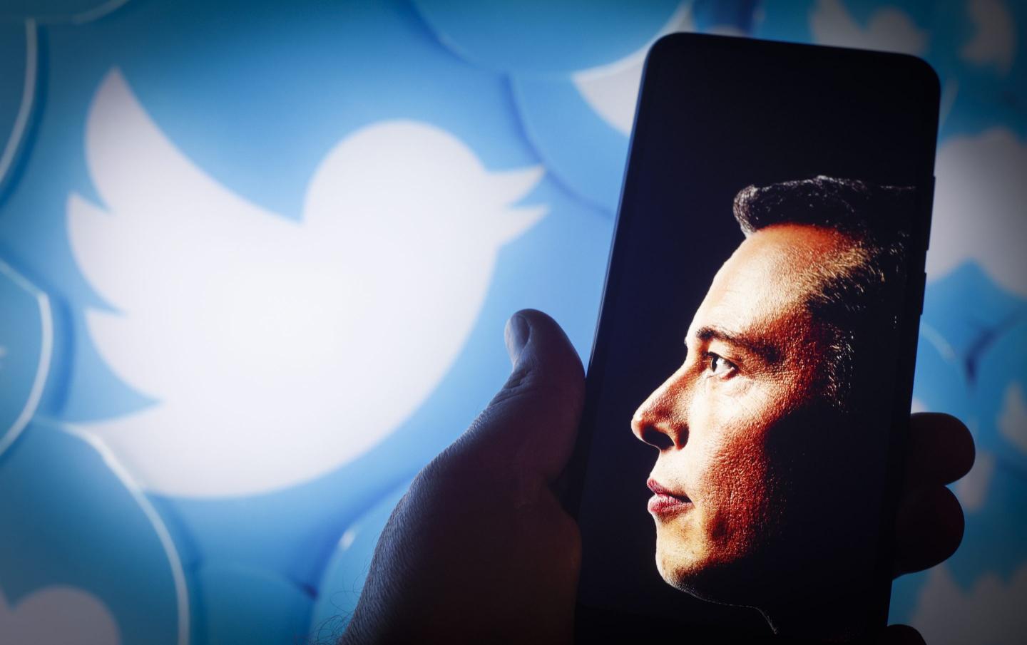 Photo of Elon Musk and the Twitter logo