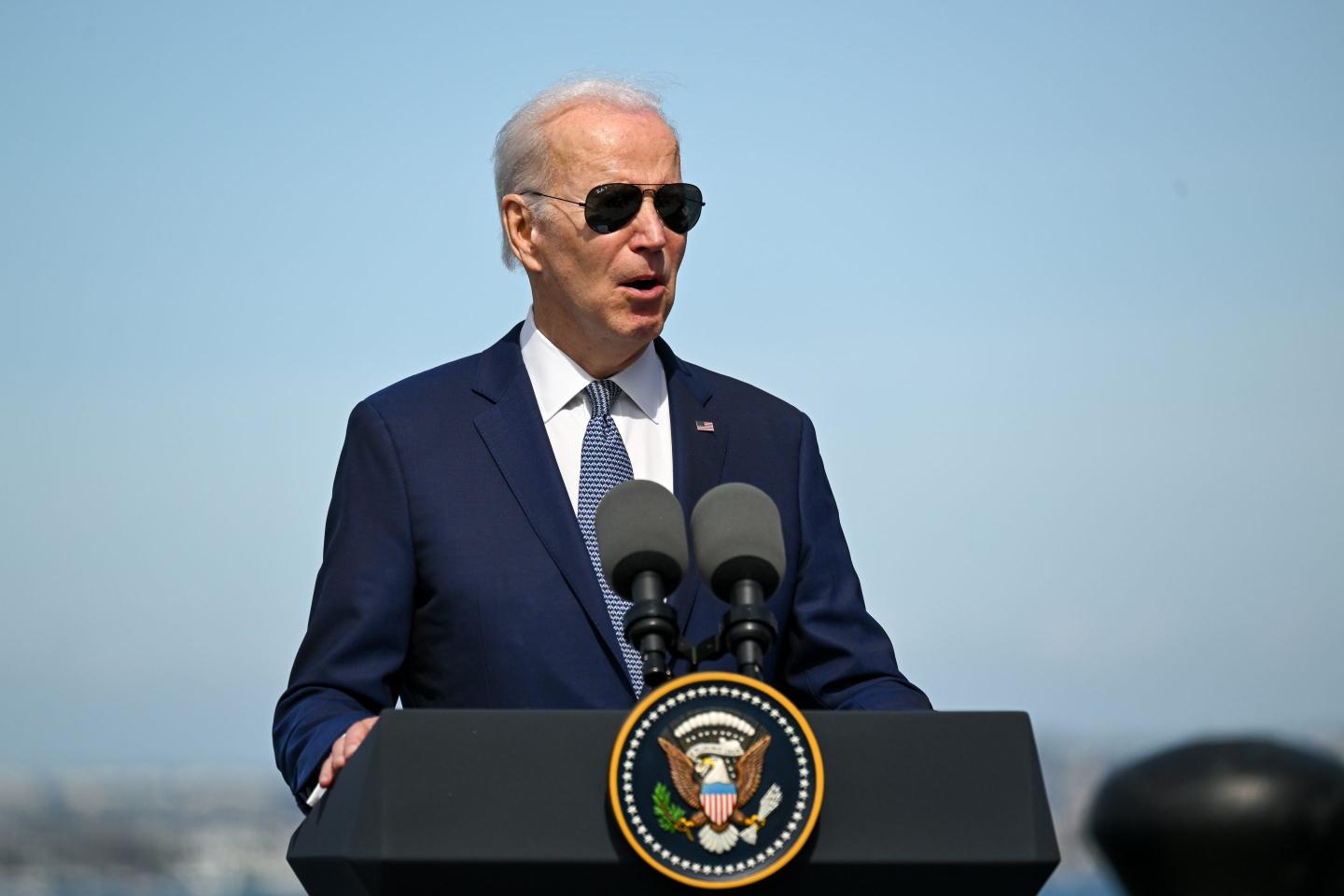 U.S. President Joe Biden delivers remarks on stage
