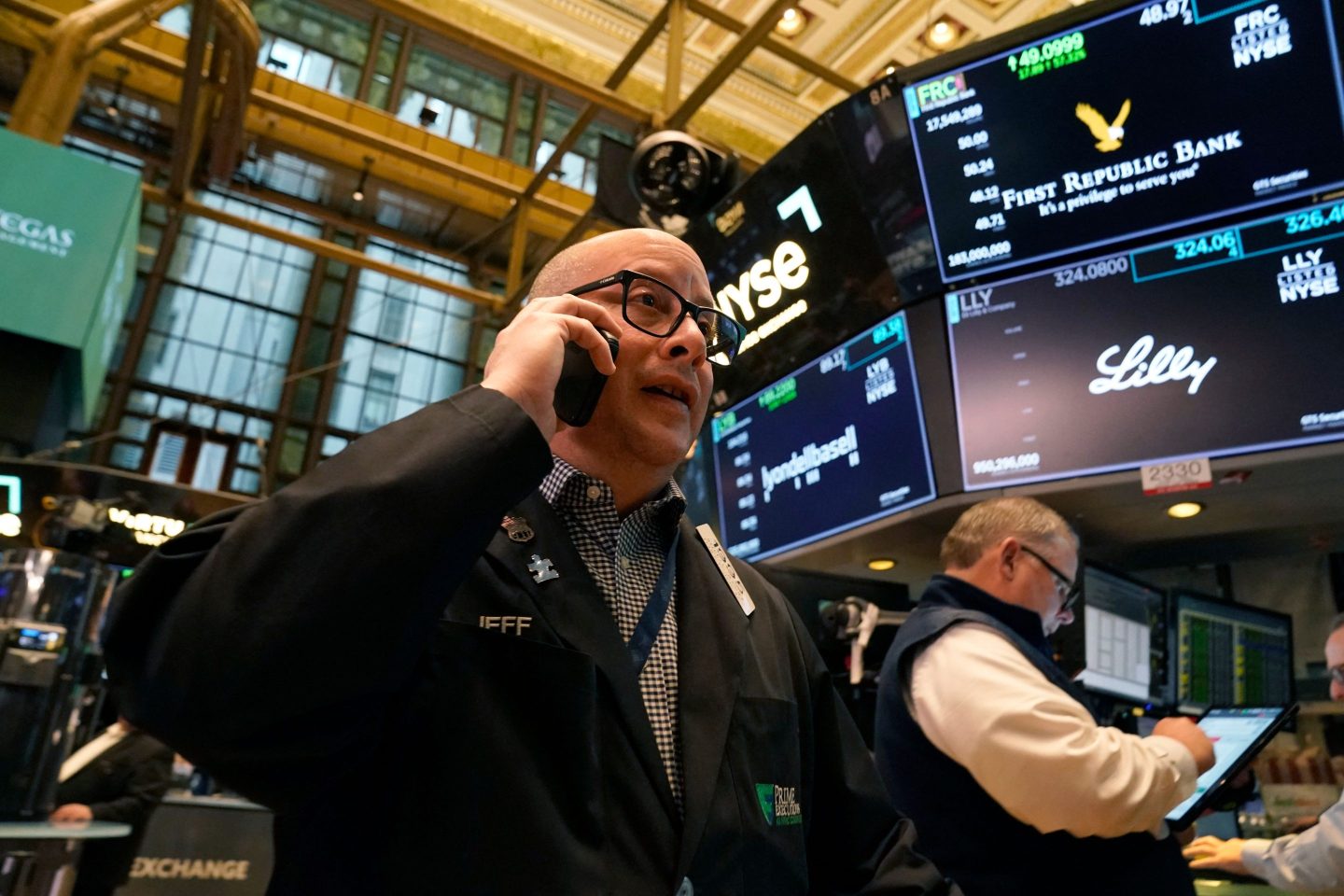 Traders work on the floor of the New York Stock Exchange on March 14, 2023, in New York.