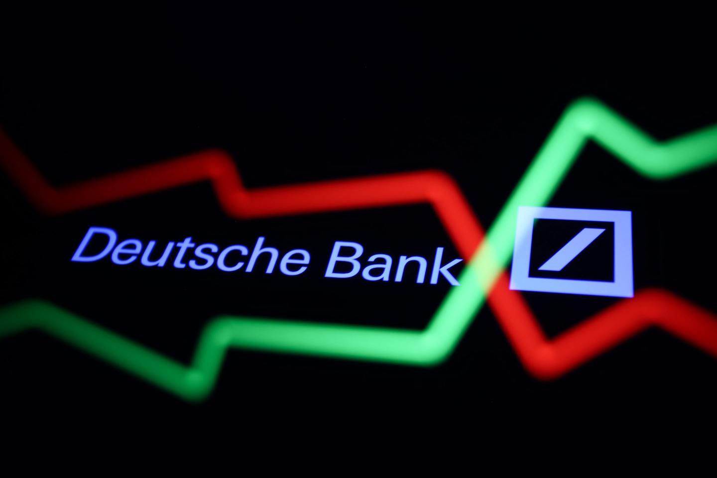 An illustrative stock chart and Deutsche Bank logo displayed on a phone screen