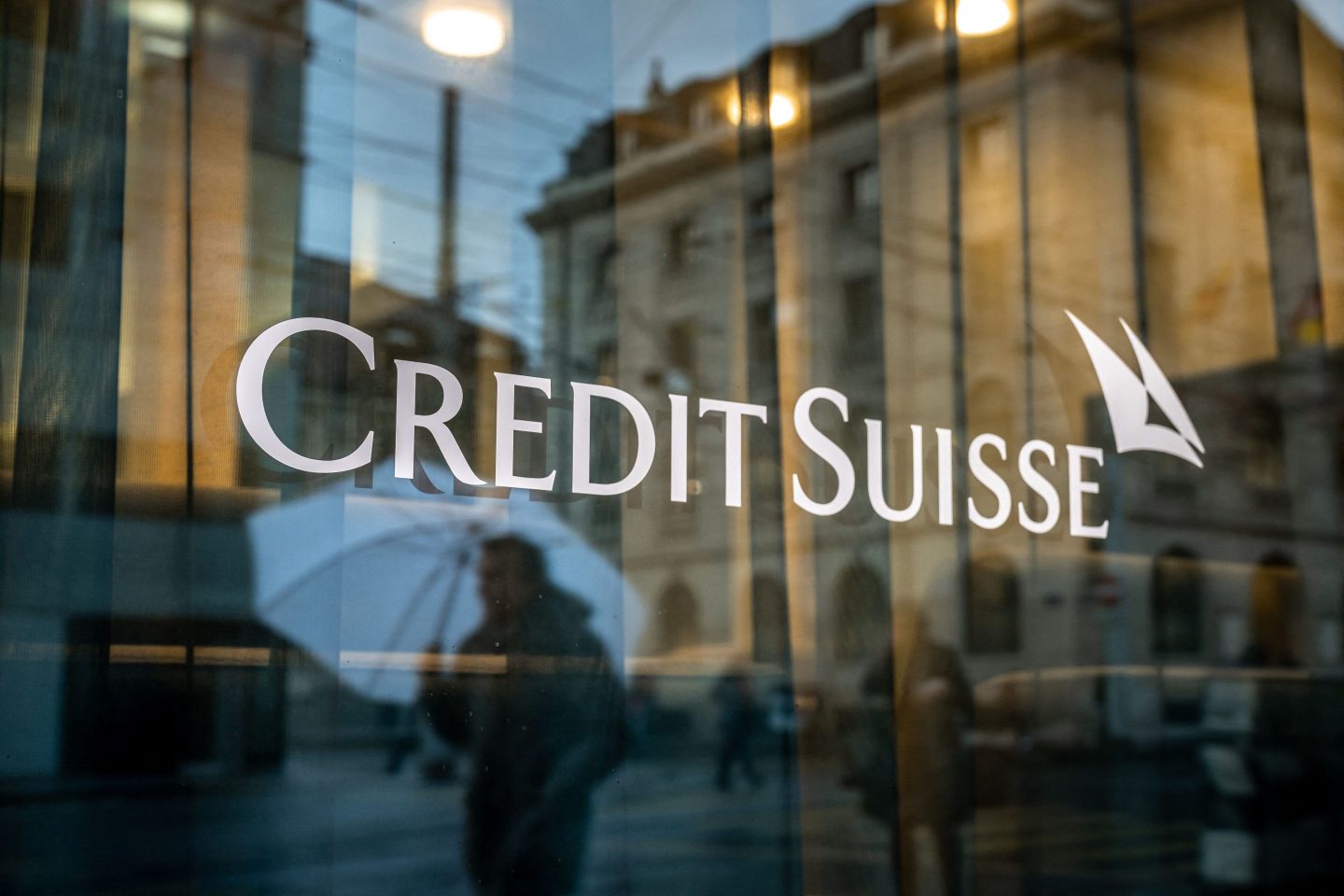 An image of the Credit Suisse logo on a storefront.