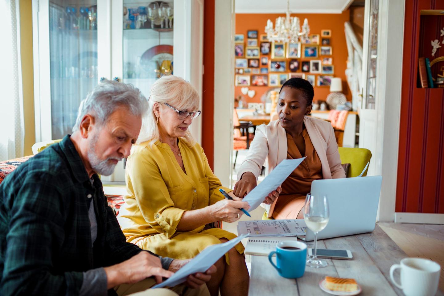 Financial advisor helping a senior couple