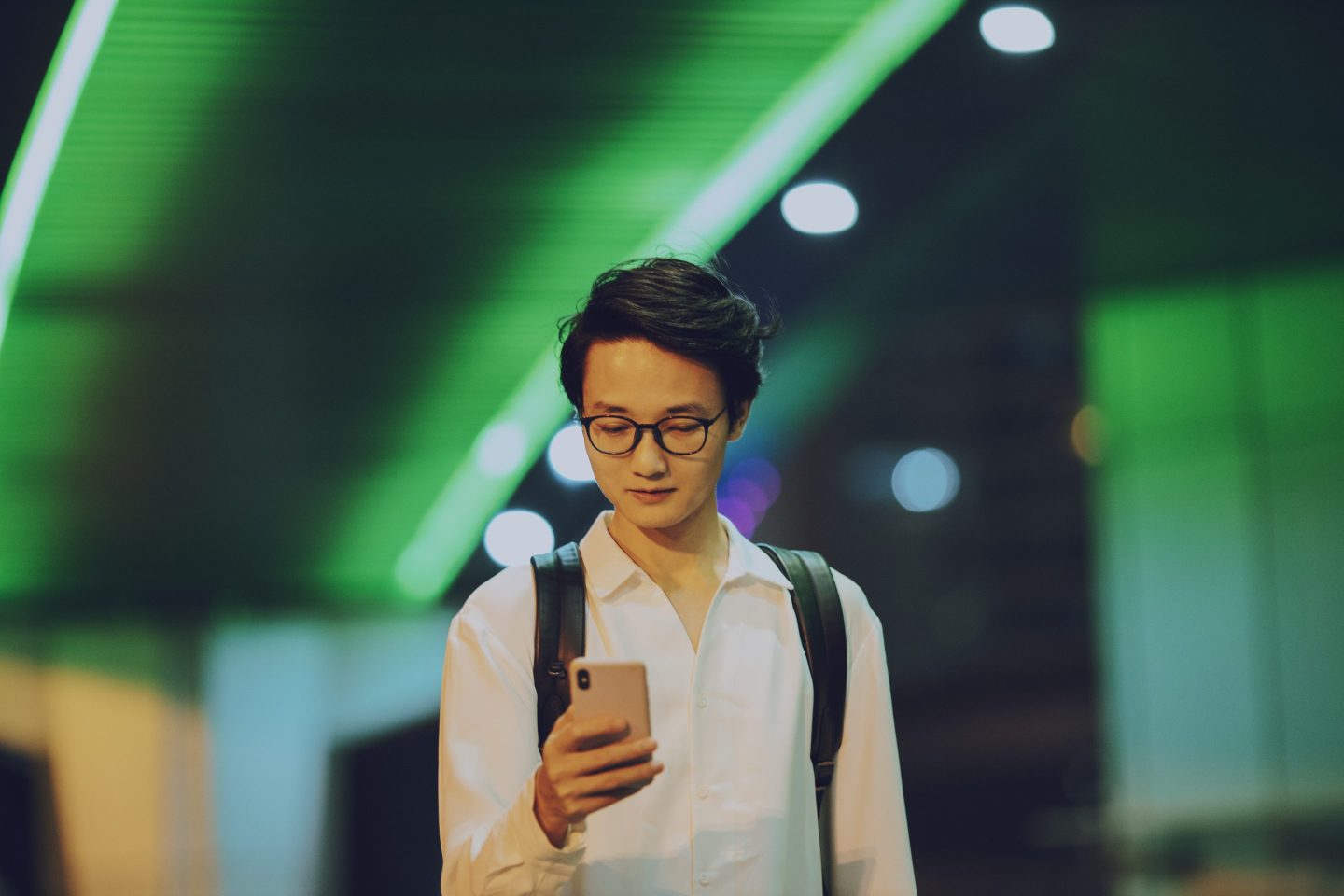 businessman using smartphone on the street