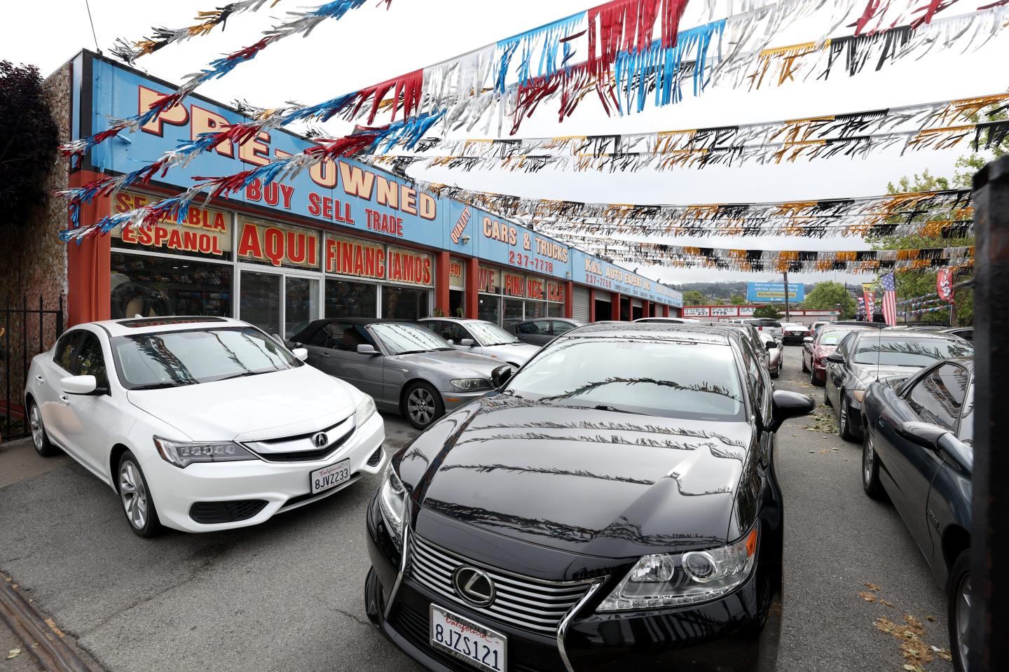 Used cars for sale are displayed on the sales lot