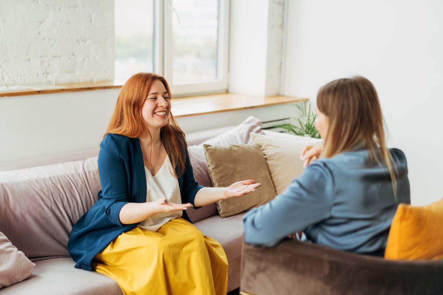 Woman smiling as she interviews for a job