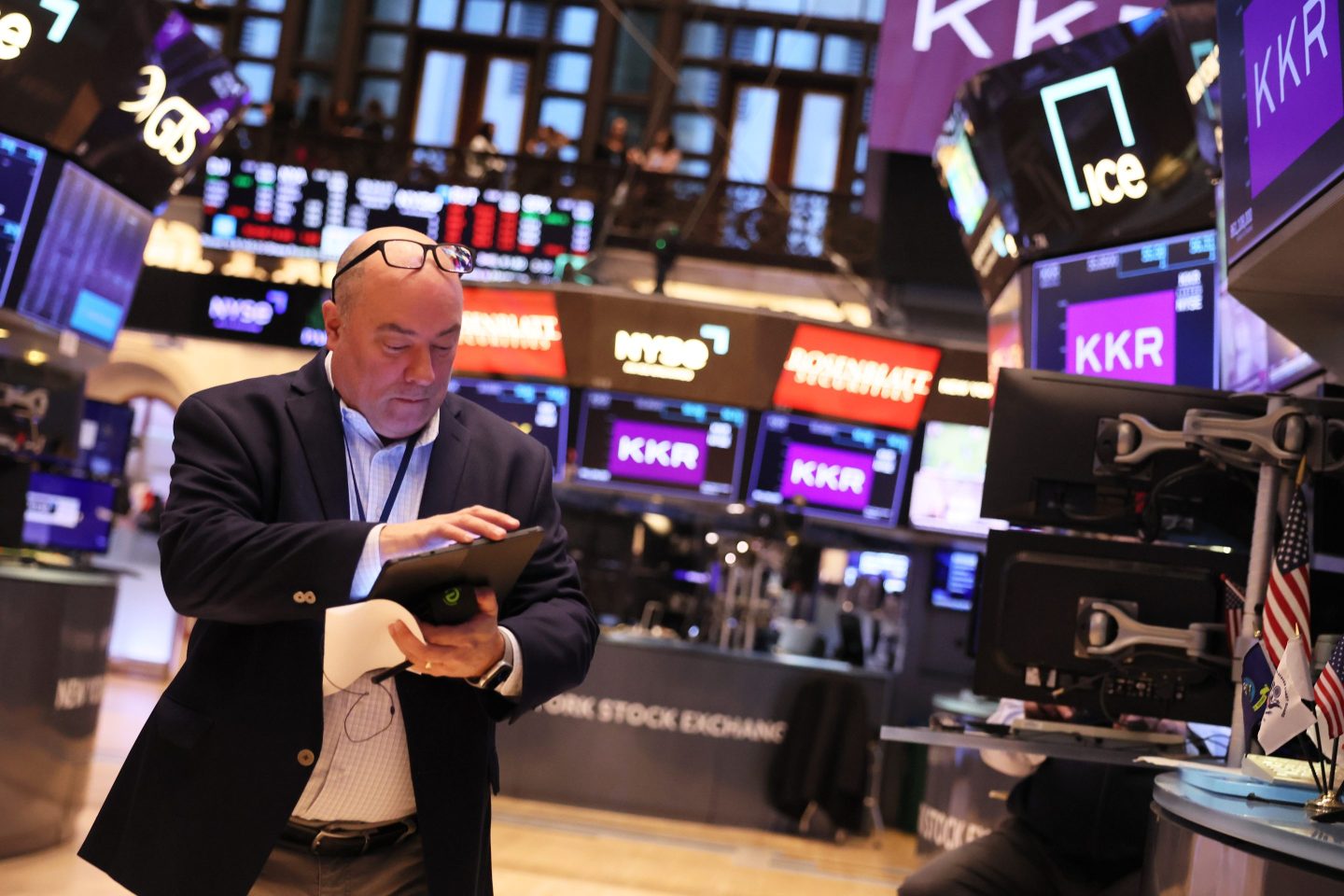 Traders work on the floor of the New York Stock Exchange.