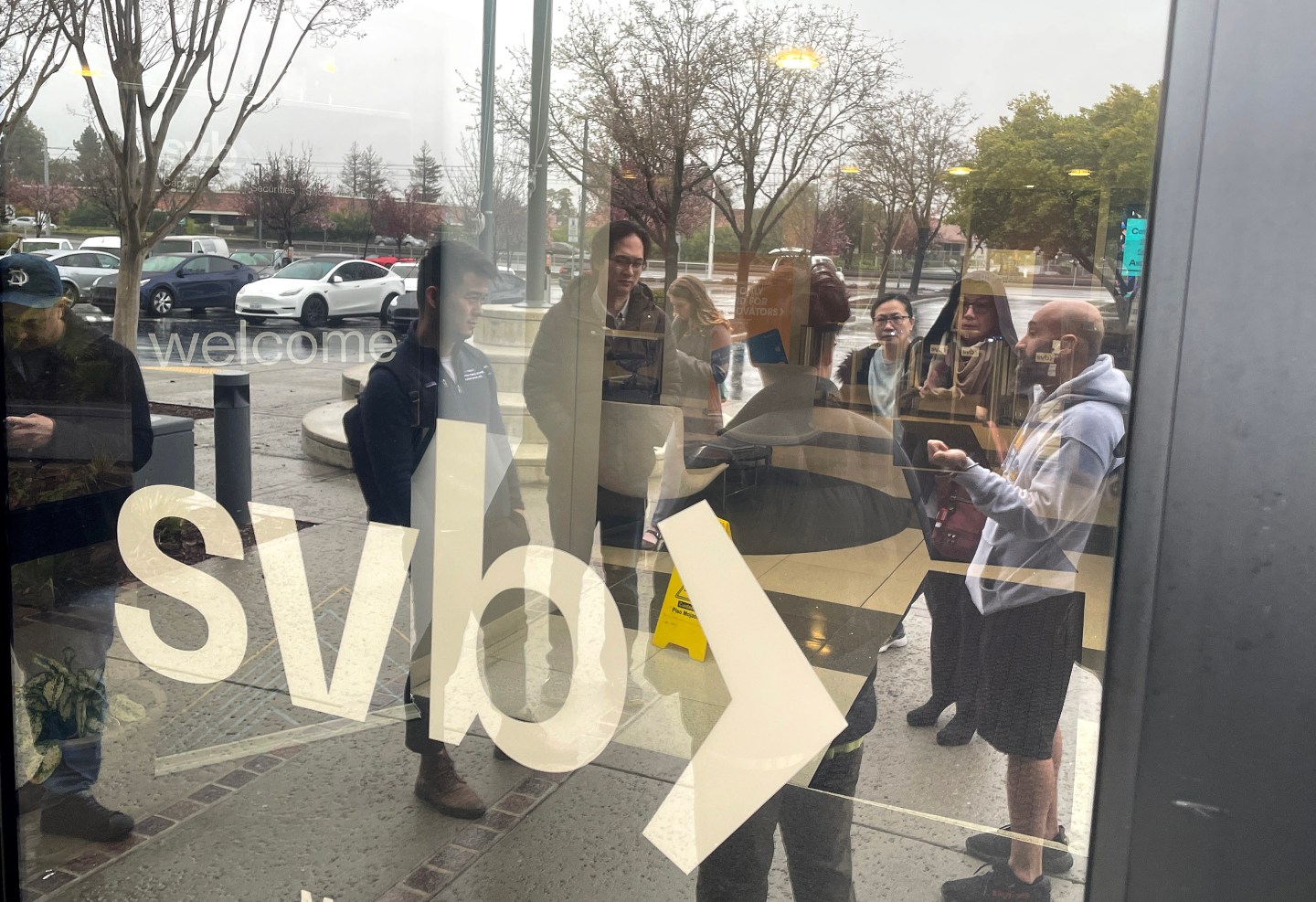 People line up outside of the shuttered Silicon Valley Bank (SVB) headquarters on March 10, 2023 in Santa Clara, California. But some short sellers suspected trouble months ago.