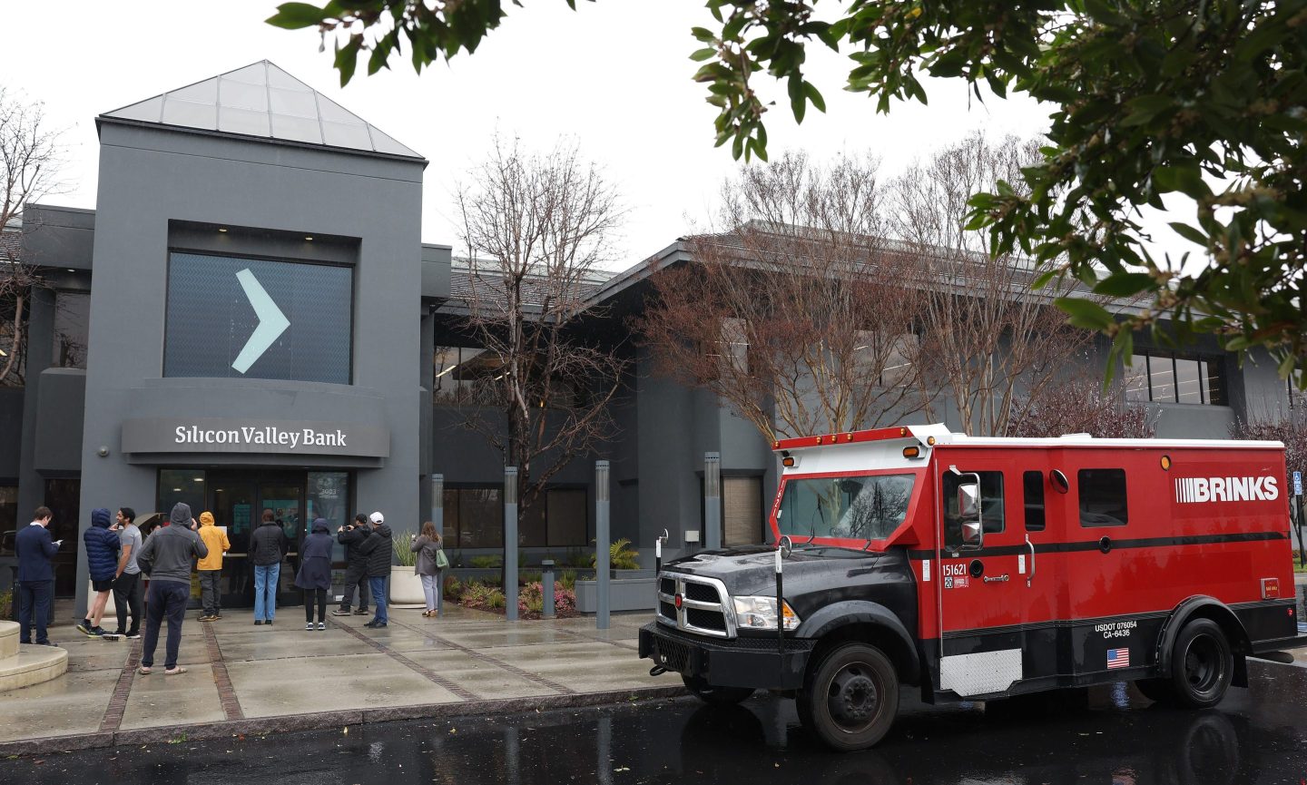 A Brinks armored truck sits parked in front of the shuttered Silicon Valley Bank (SVB) headquarters on March 10, 2023 in Santa Clara, California. Silicon Valley Bank was shut down on Friday morning by California regulators and was put in control of the U.S. Federal Deposit Insurance Corporation.