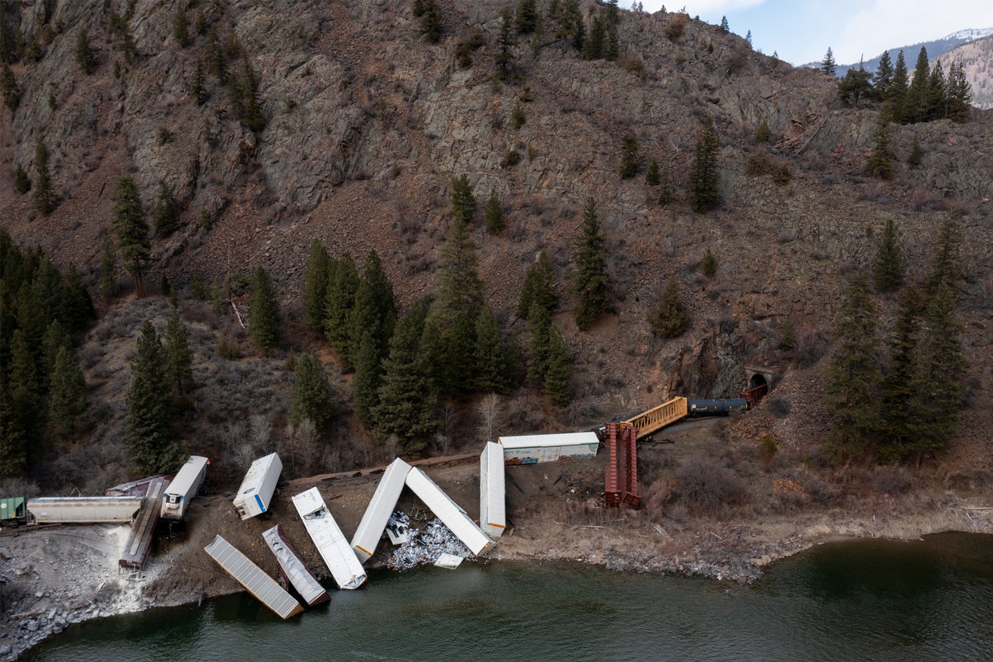 A train sits derailed near Quinn's Hot Springs Resort west of St. Regis, Mont., on April 2, 2023.