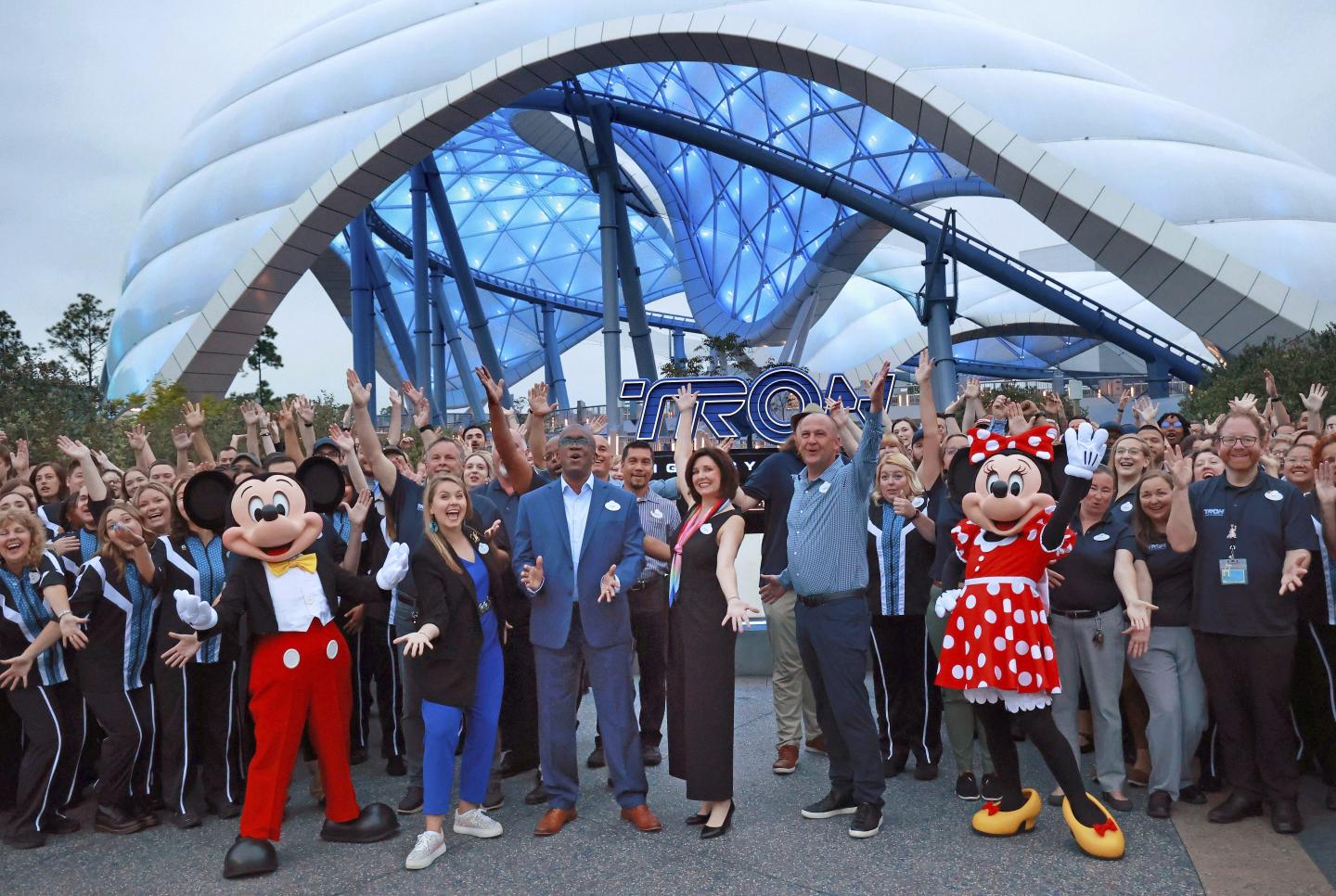 Mickey, Minnie and cast members join Walt Disney World executives in a ceremony marking the official opening of Tron Lightcycle / Run at the Magic Kingdom in Lake Buena Vista, Fla., on Monday, April 3, 2023. 