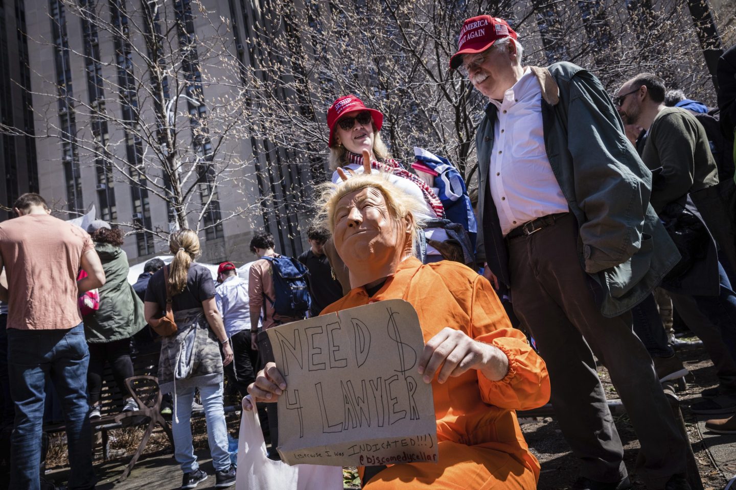 A Donald Trump impersonator appears at a protest held in Collect Pond Park, Tuesday, April 4, 2023, across the street from the Manhattan District Attorney's office in New York.
