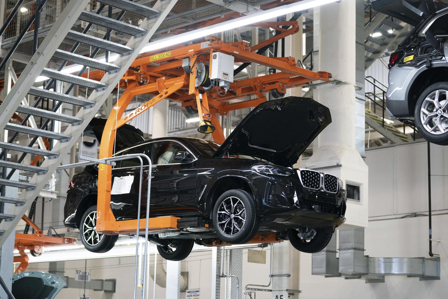 Cars move on the assembly line at the BMW Spartanburg plant in Greer, S.C., Wednesday, October 19, 2022.
