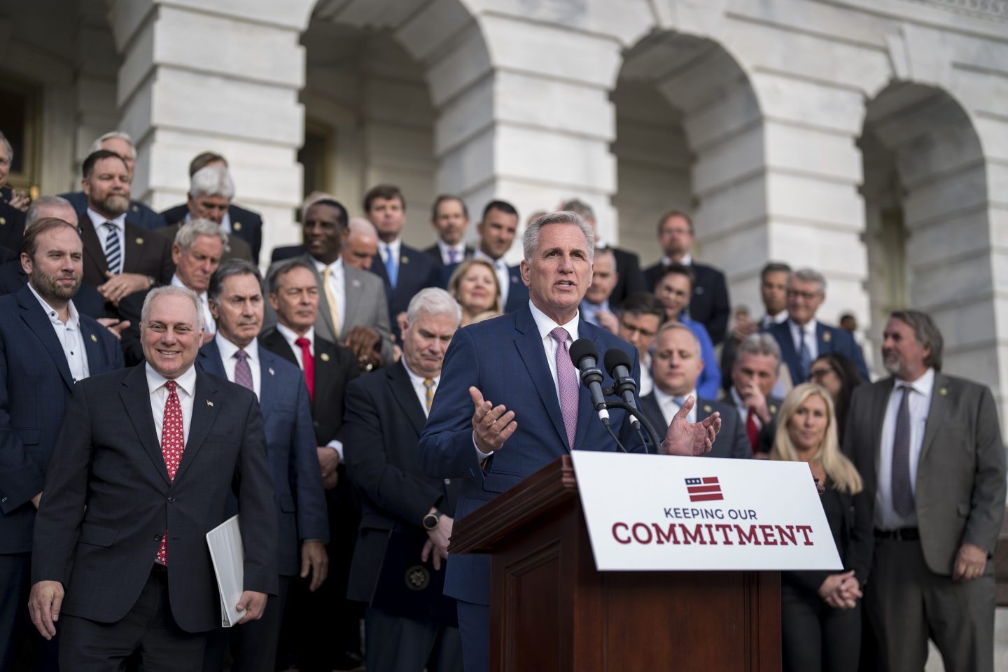 Speaker of the House Kevin McCarthy, R-Calif., joined at far left by House Majority Leader Steve Scalise, R-La., holds an event to mark 100 days of the Republican majority in the House, at the Capitol in Washington, on April 17, 2023.