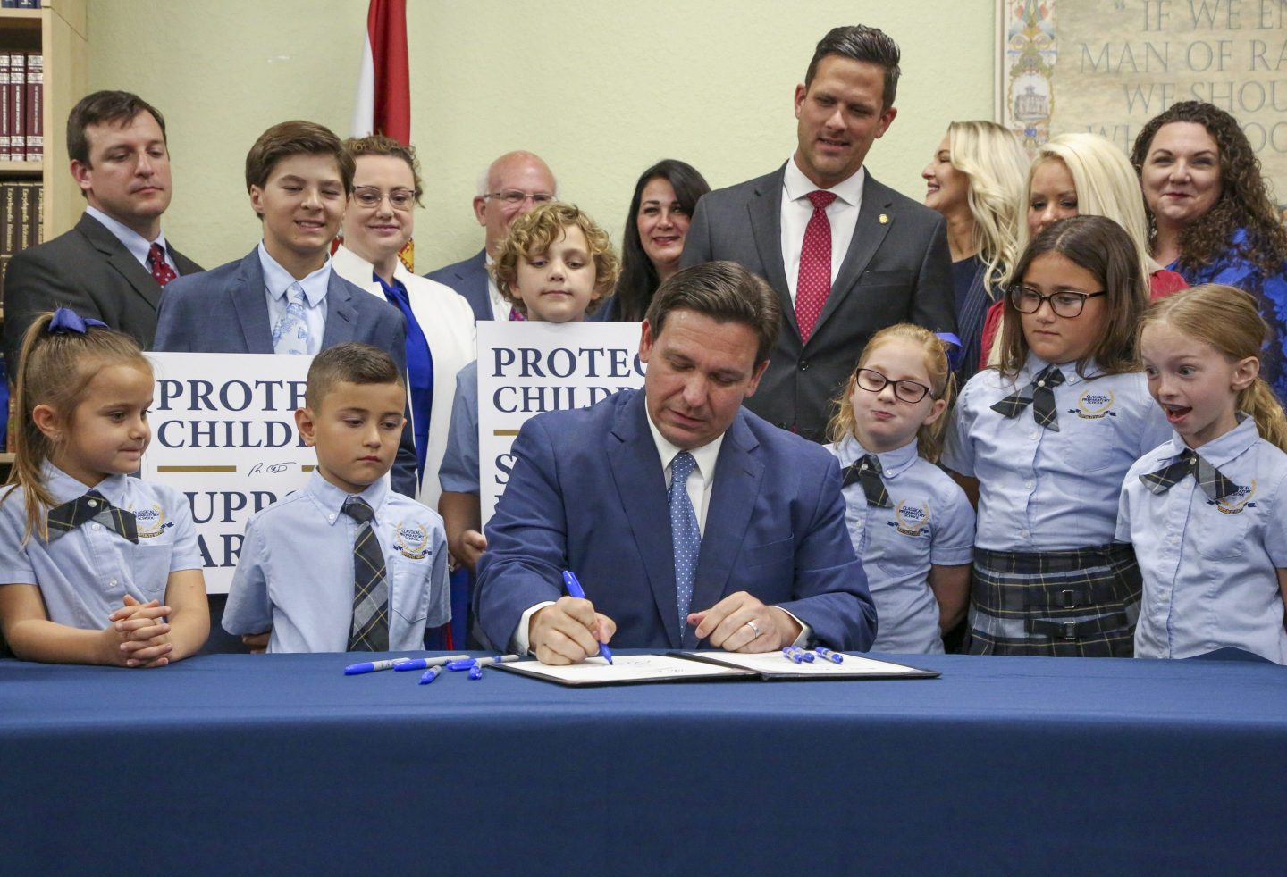 Florida Gov. Ron DeSantis signs the Parental Rights in Education bill at Classical Preparatory school on March 28, 2022, in Shady Hills, Fla.