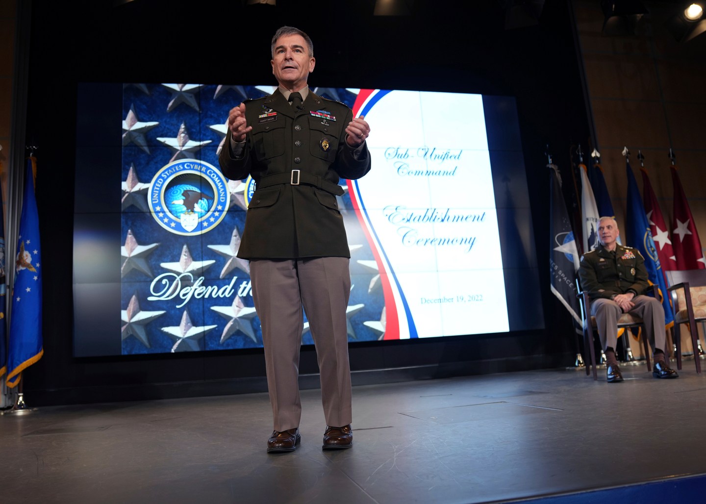 In this image provided by U.S. Cyber Command, Army Major Gen. William Hartman, commander of U.S. Cyber Command's Cyber National Mission Force, speaks during a ceremony at U.S. Cyber Command headquarters at Fort George E. Meade, Md., on Dec. 19, 2022.