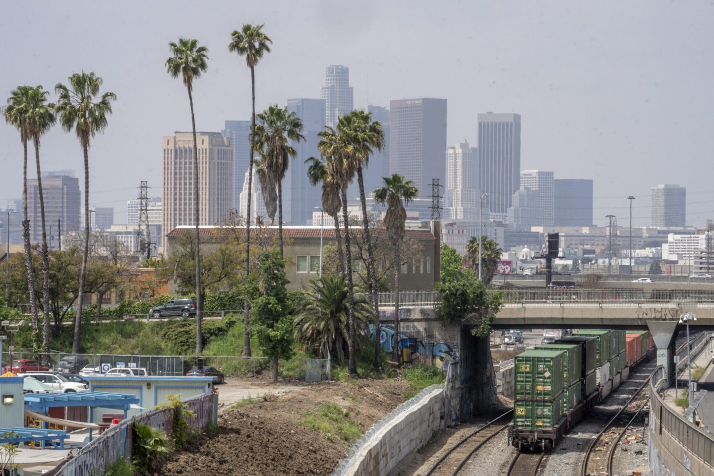 Los Angeles skyline is seen above the Union Pacific LATC Intermodal Terminal is seen on Tuesday, April 25, 2023 in Los Angeles.